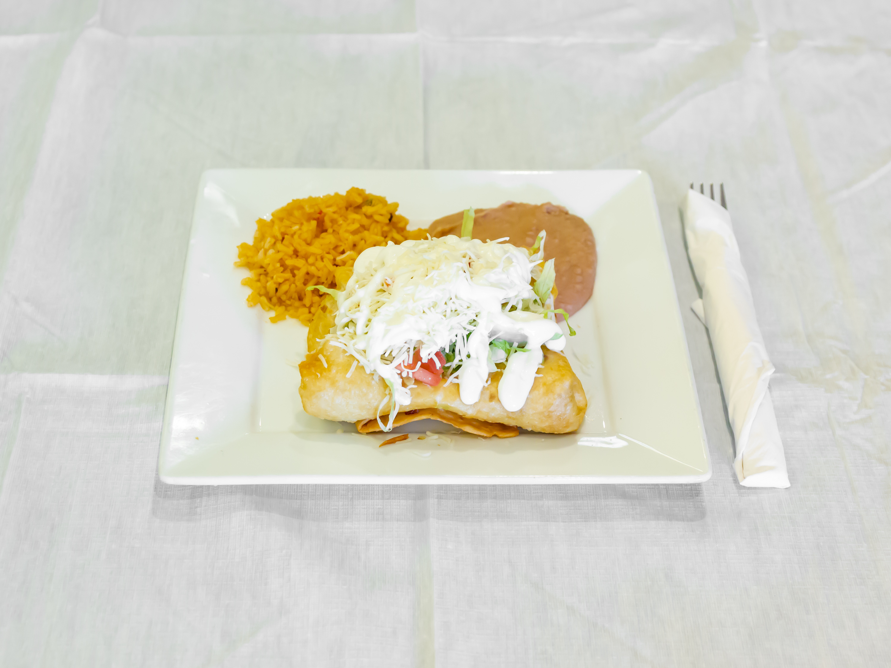 Order Chimichanga food online from Senor Lopez Mexican Restaurant store, Detroit on bringmethat.com