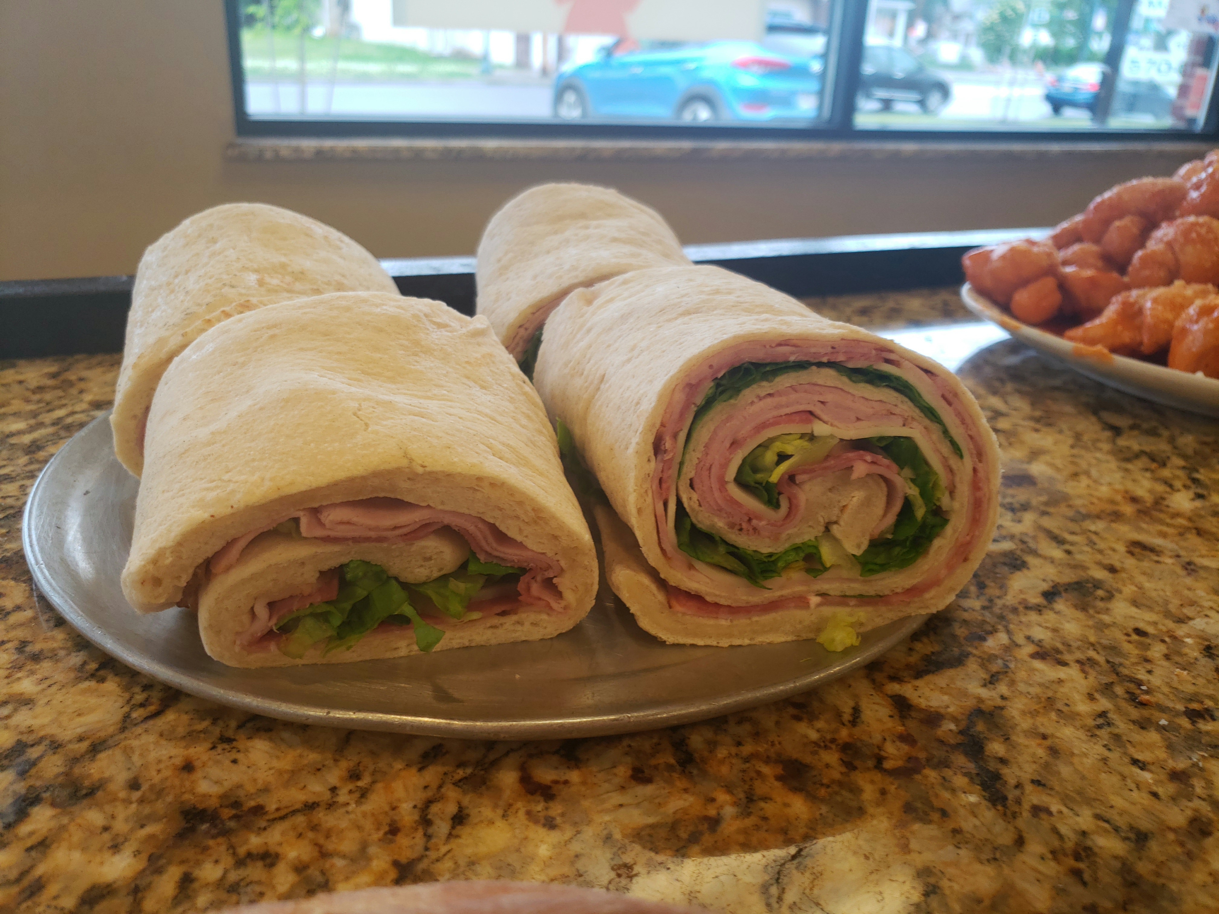 Order Wrap food online from Antonio's Pizza store, West Pittston on bringmethat.com
