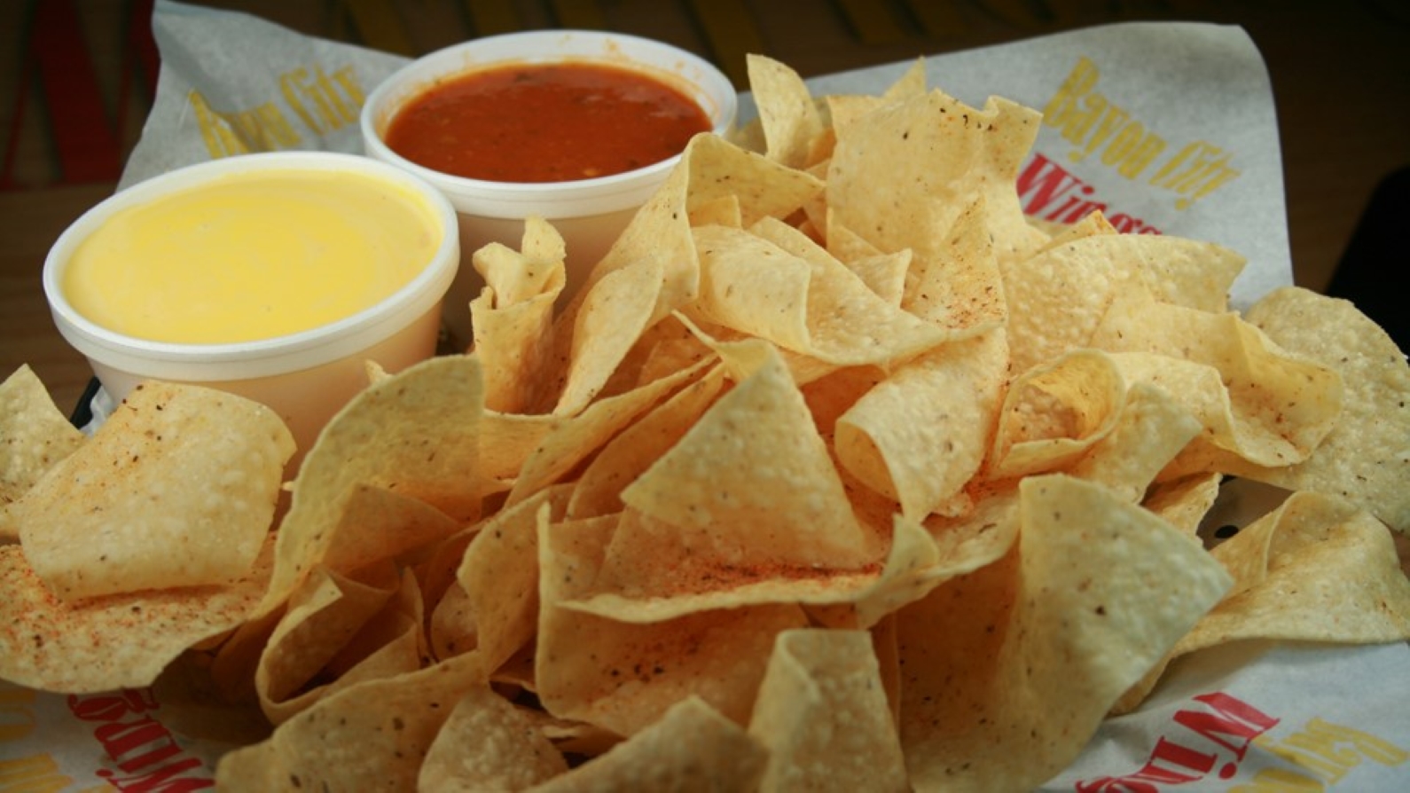 Order Chips con Queso & Salsa food online from Atomic wings store, New York on bringmethat.com