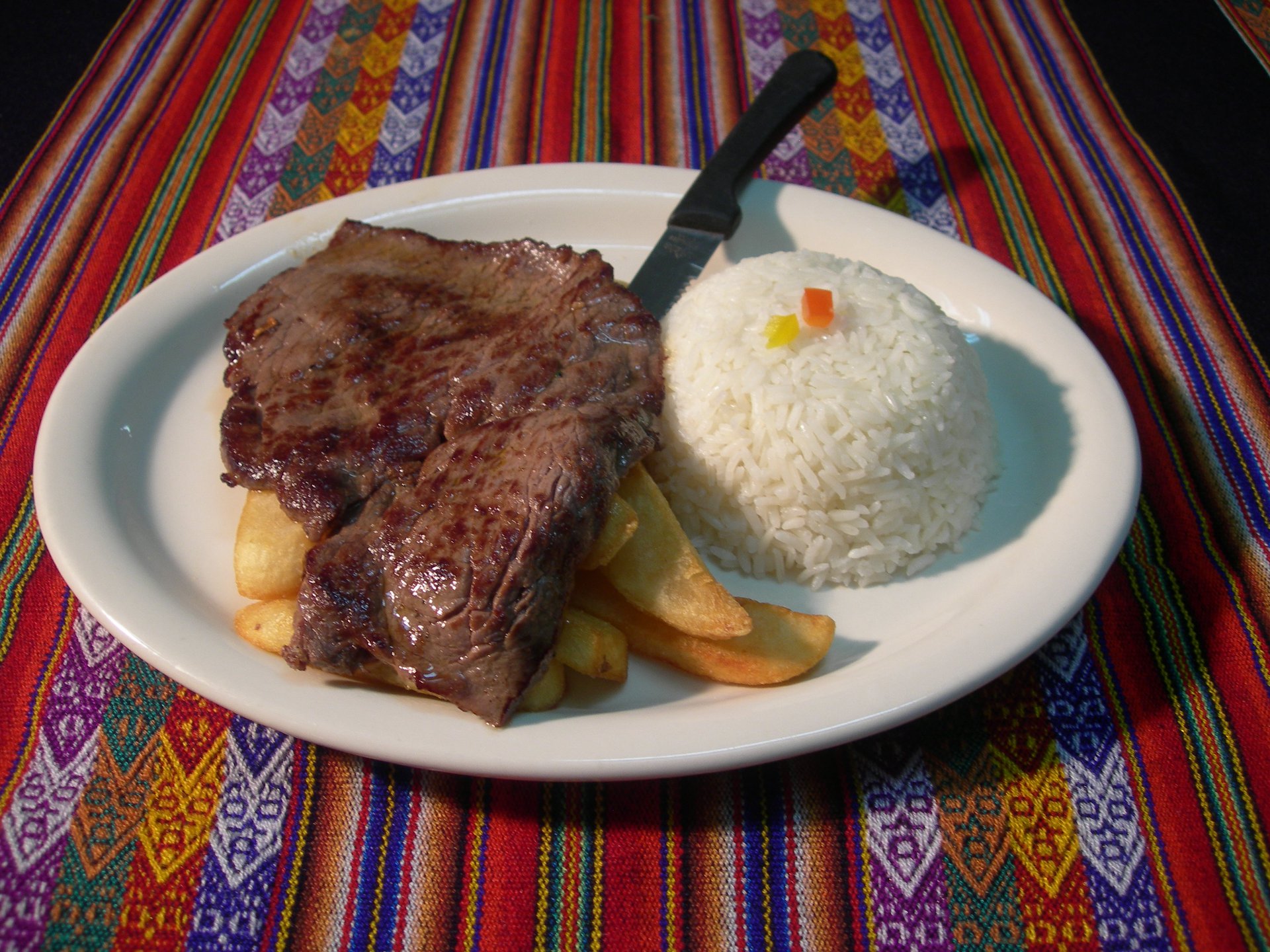 Order 26. Bisteck con Papas Fritas food online from Aires Del Peru store, Garden Grove on bringmethat.com