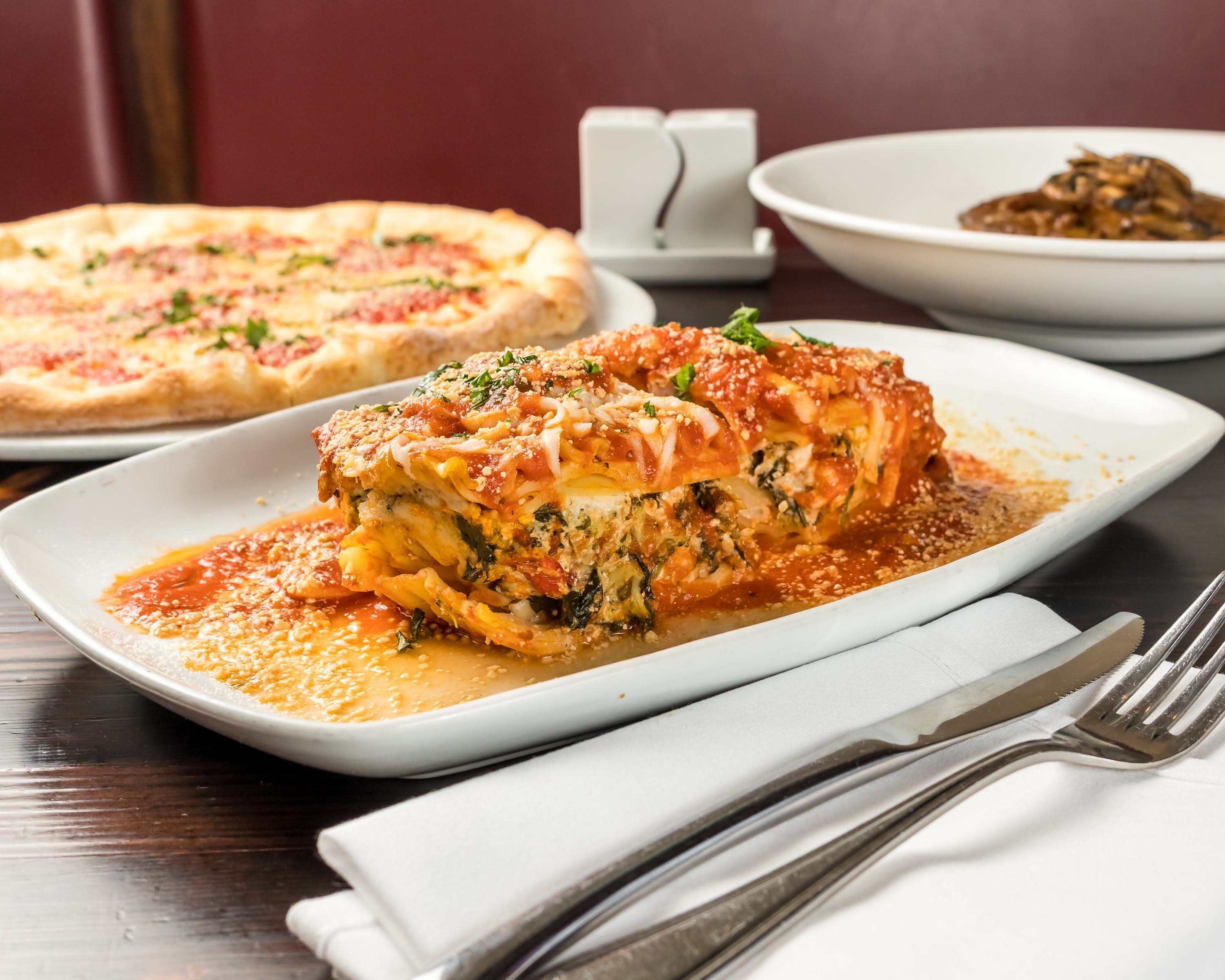 Order Vegetable Lasagna food online from 3 Brothers Pizza Cafe store, Farmingdale on bringmethat.com