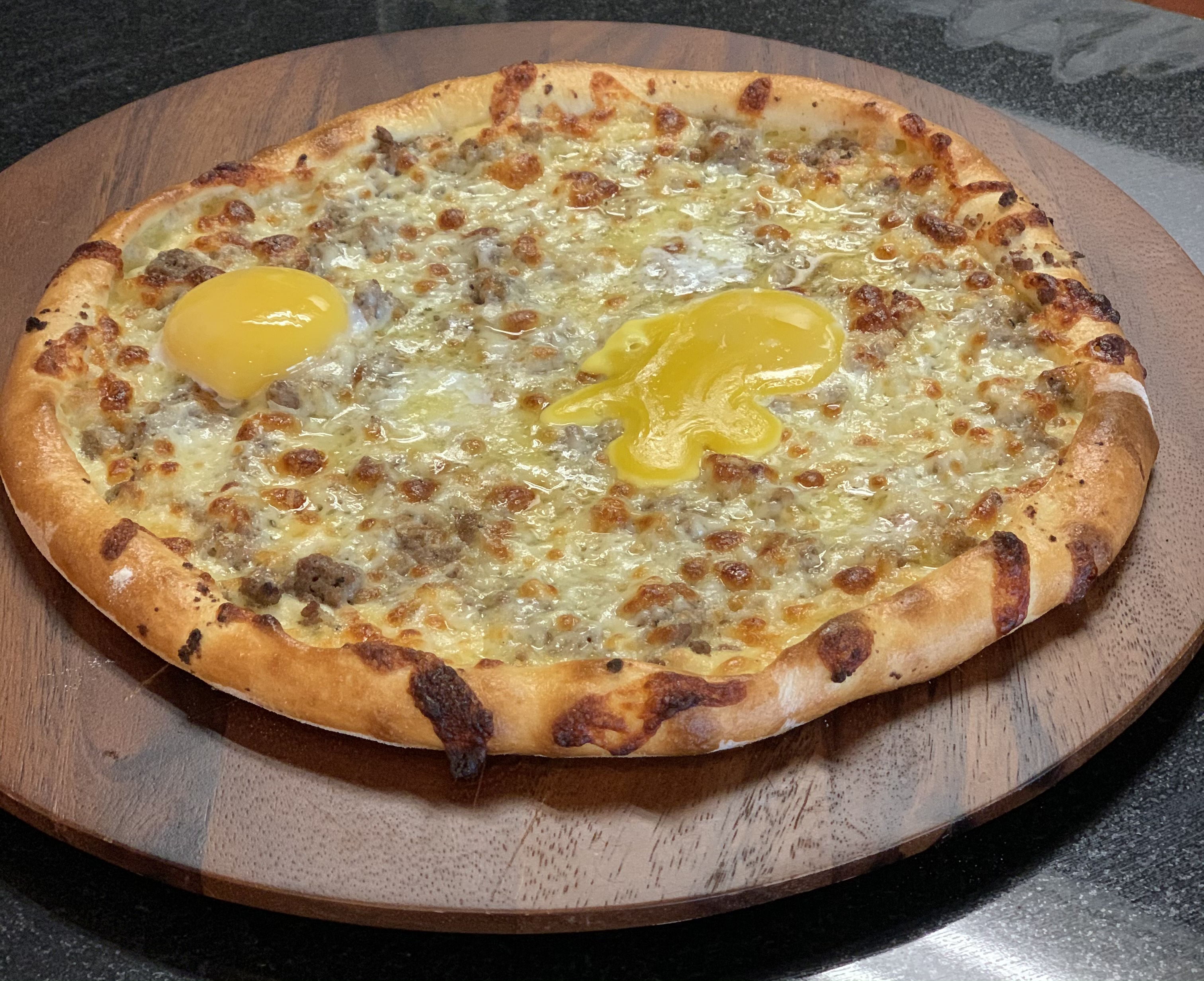 Order Round Ground Beef and Egg Pide food online from Pide Lahmajoun store, Cliffside Park on bringmethat.com