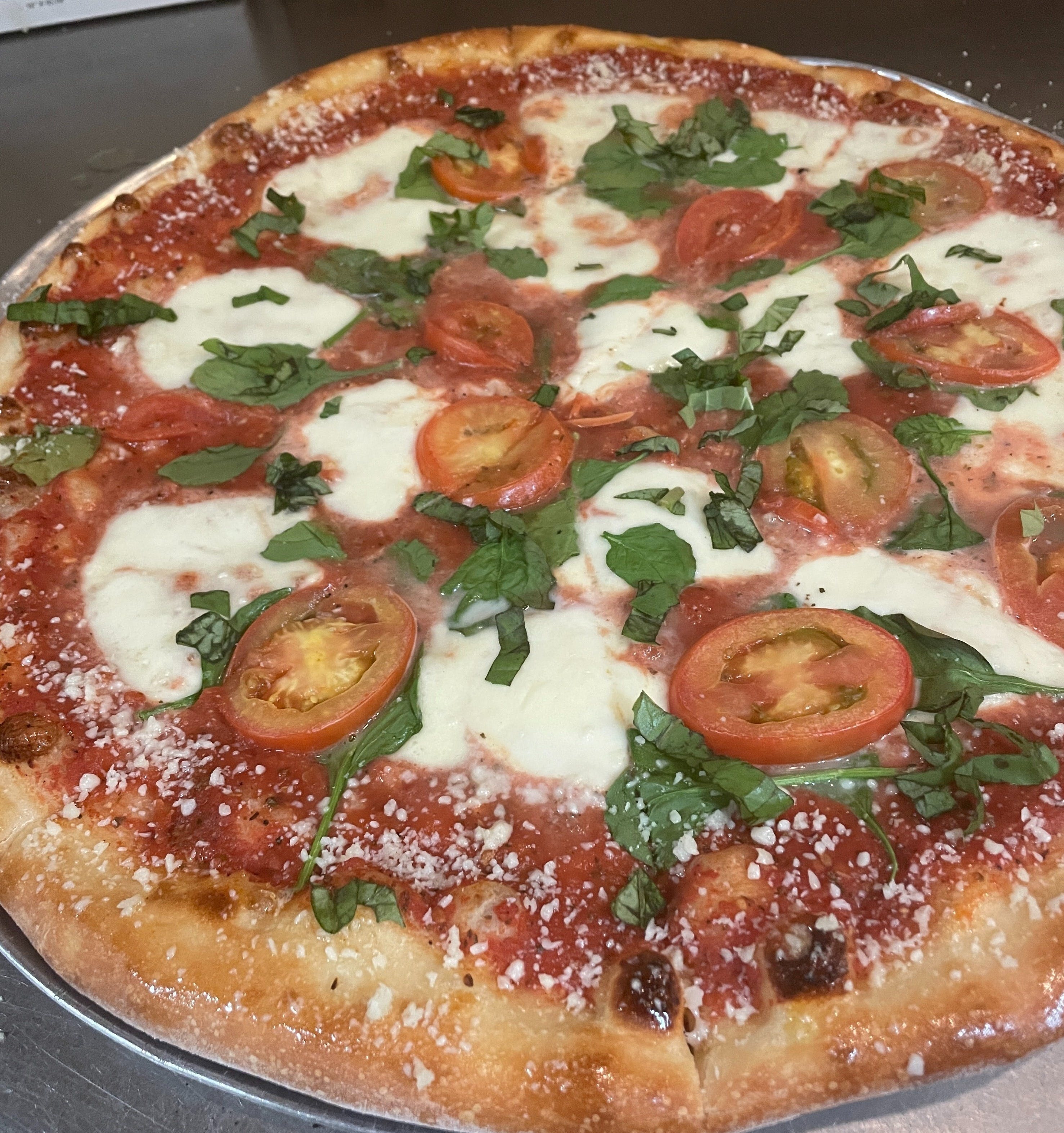 Order Cheap Seats Margarita Pizza - Large 16" food online from Cheap Seats Tavern 2 store, Bluffton on bringmethat.com