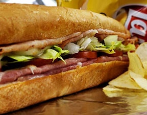 Order Ham, Turkey & Cheese Sub food online from Uncle John Pizza store, Grand Prairie on bringmethat.com