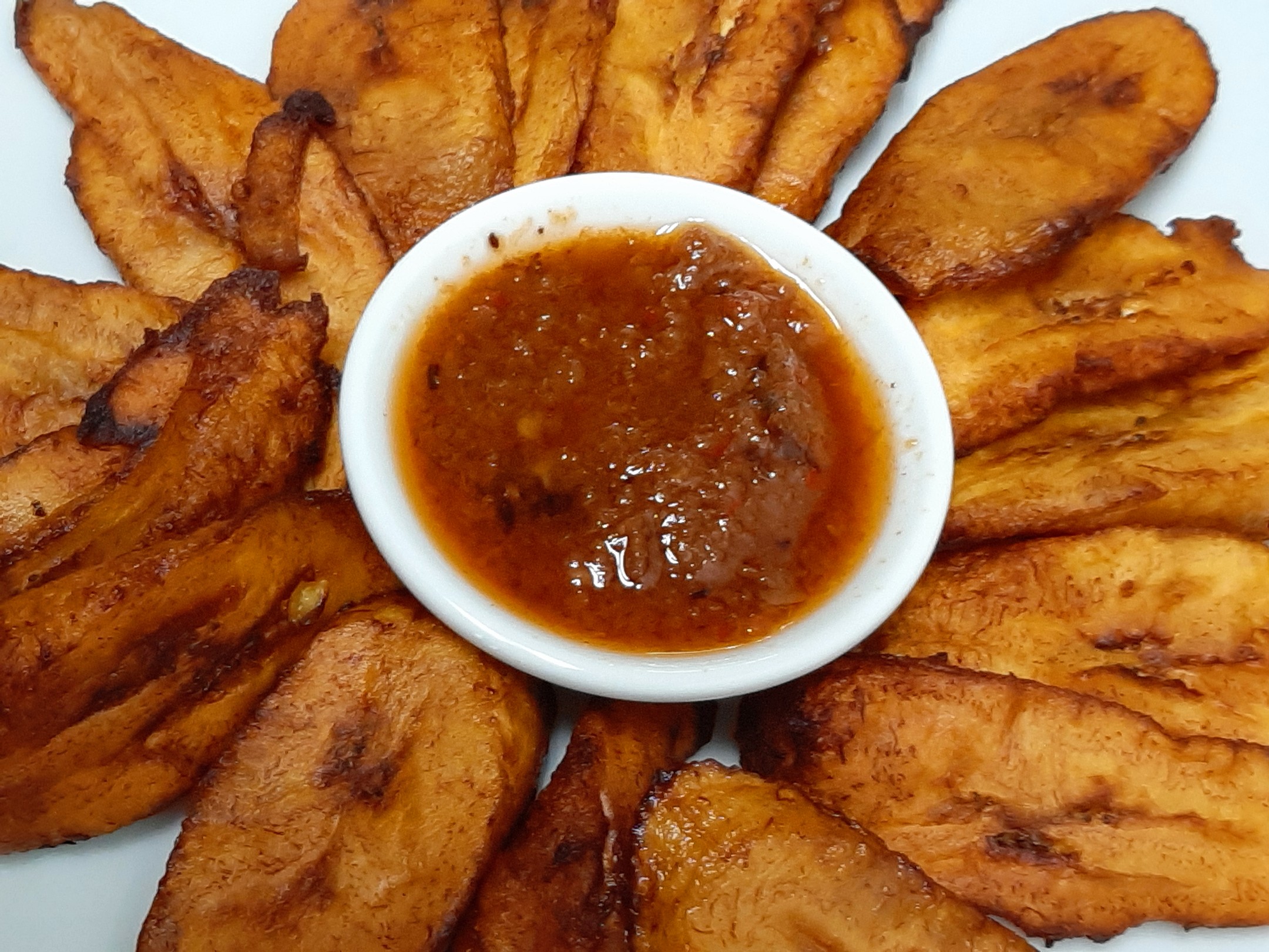 Order Plantains  food online from Monrovia Lounge store, Dallas on bringmethat.com