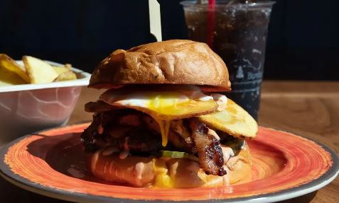 Order The Farmers Burger food online from Divine Bovine Burgers store, Tucson on bringmethat.com