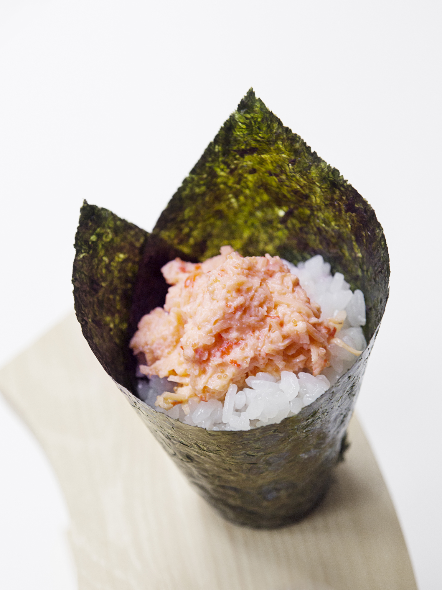 Order Spicy Crab Handroll food online from Aki Sushi store, New York on bringmethat.com