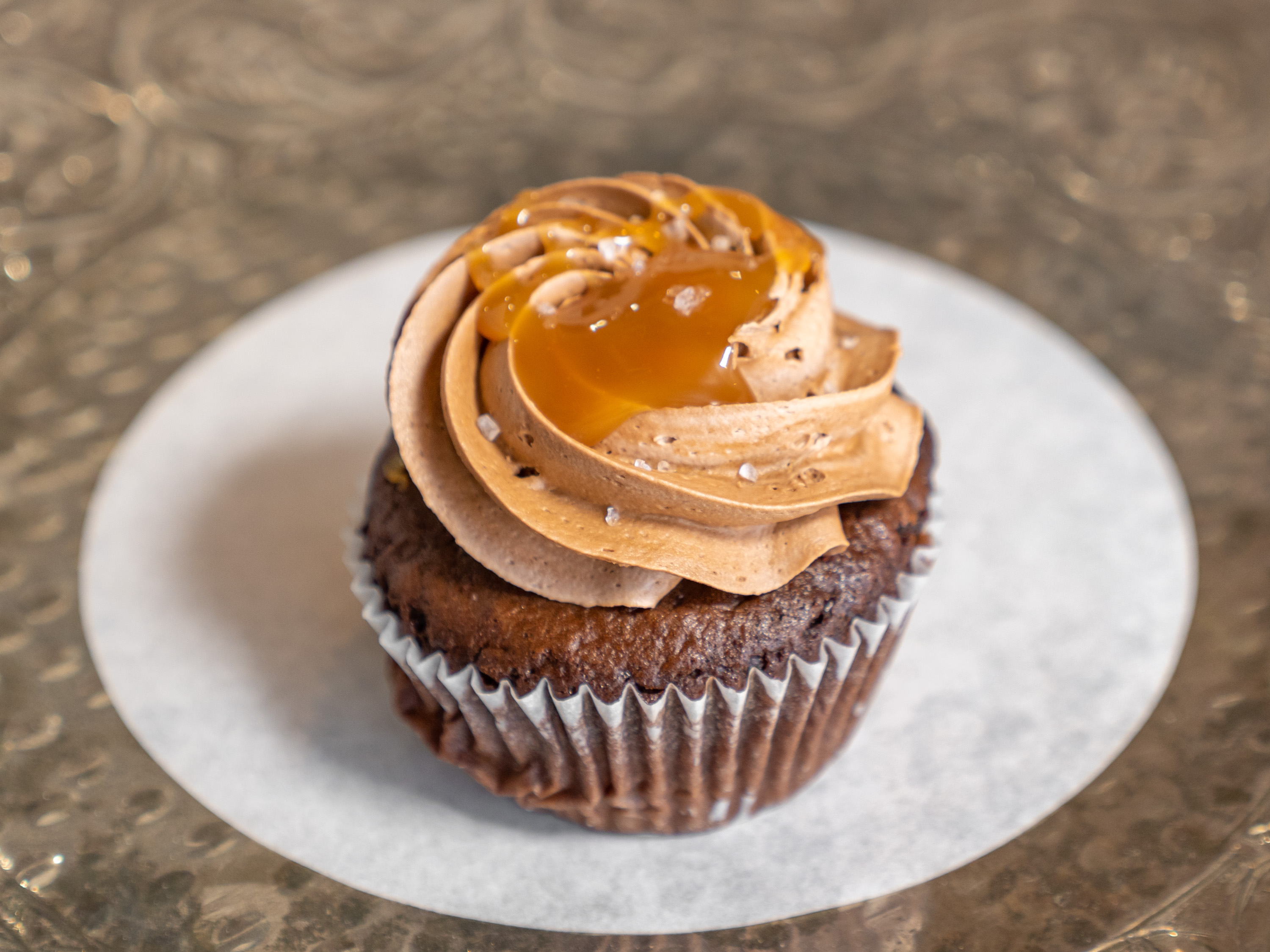 Order Salted Caramel Cupcake food online from Frosted Flour store, Lodi on bringmethat.com