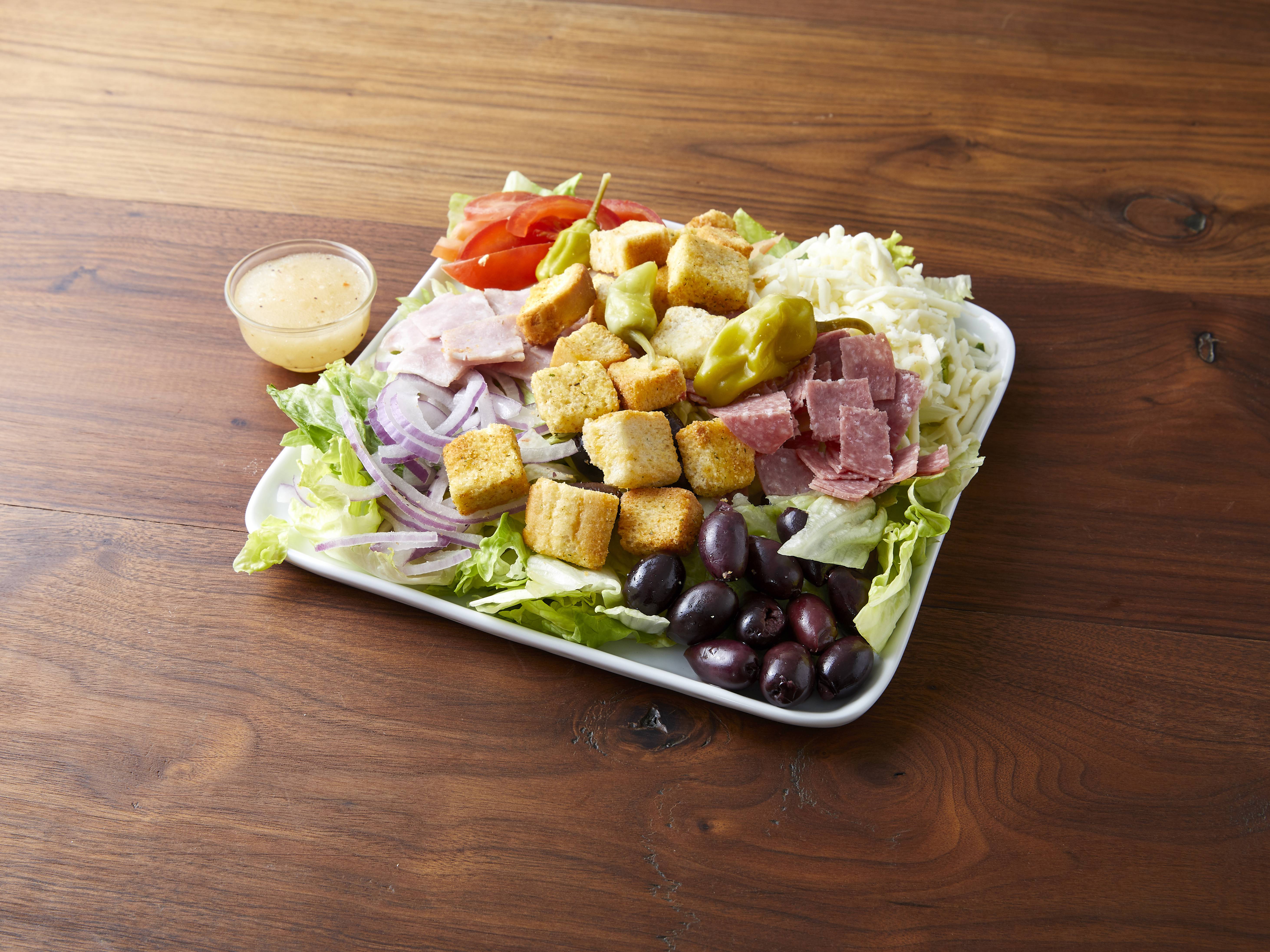 Order Antipasto Salad food online from Happy's Pizza store, Walled Lake on bringmethat.com