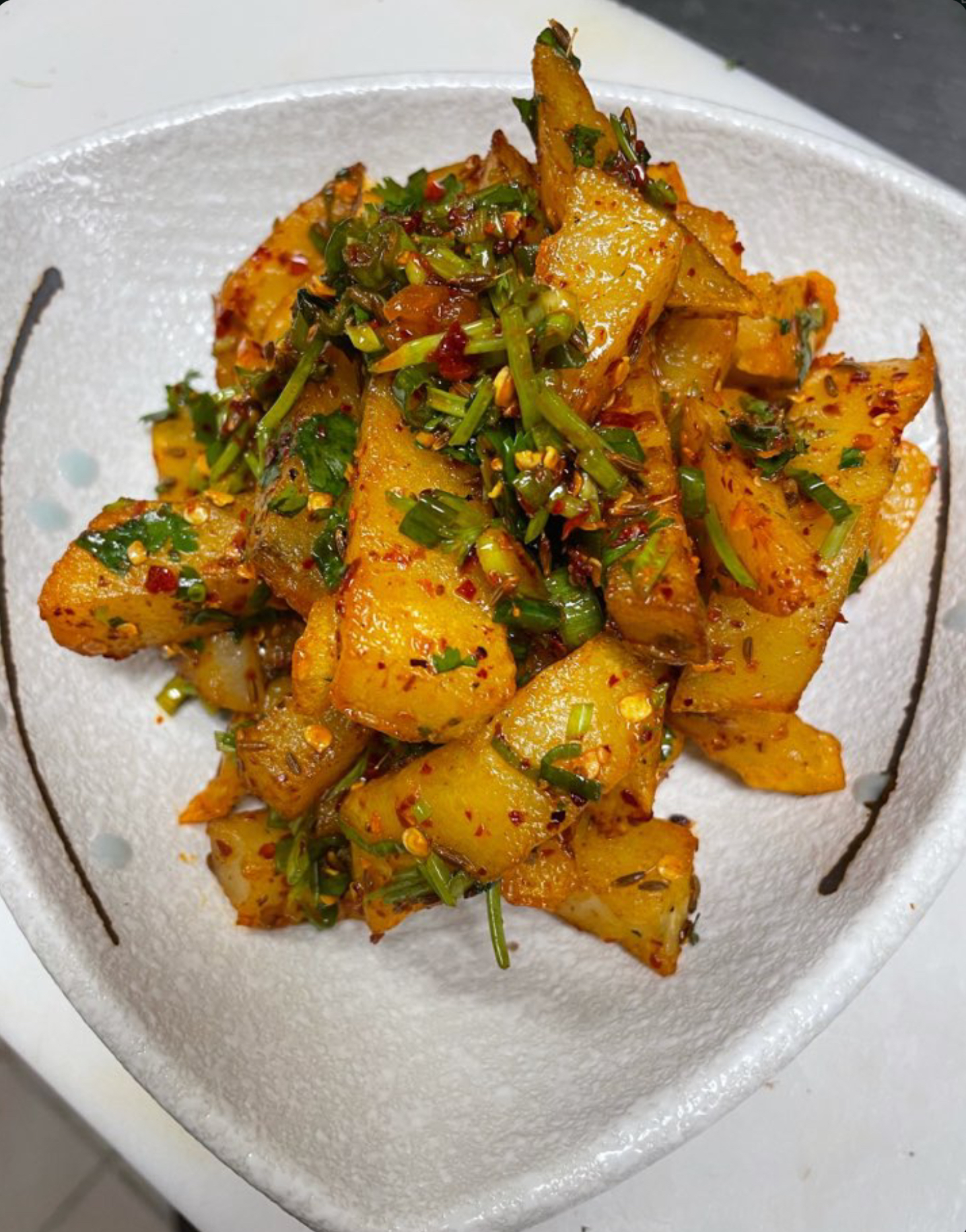 Order Spicy Crinkle-Cut Potatoes 狼牙土豆 food online from The Mandarin store, Menlo Park on bringmethat.com