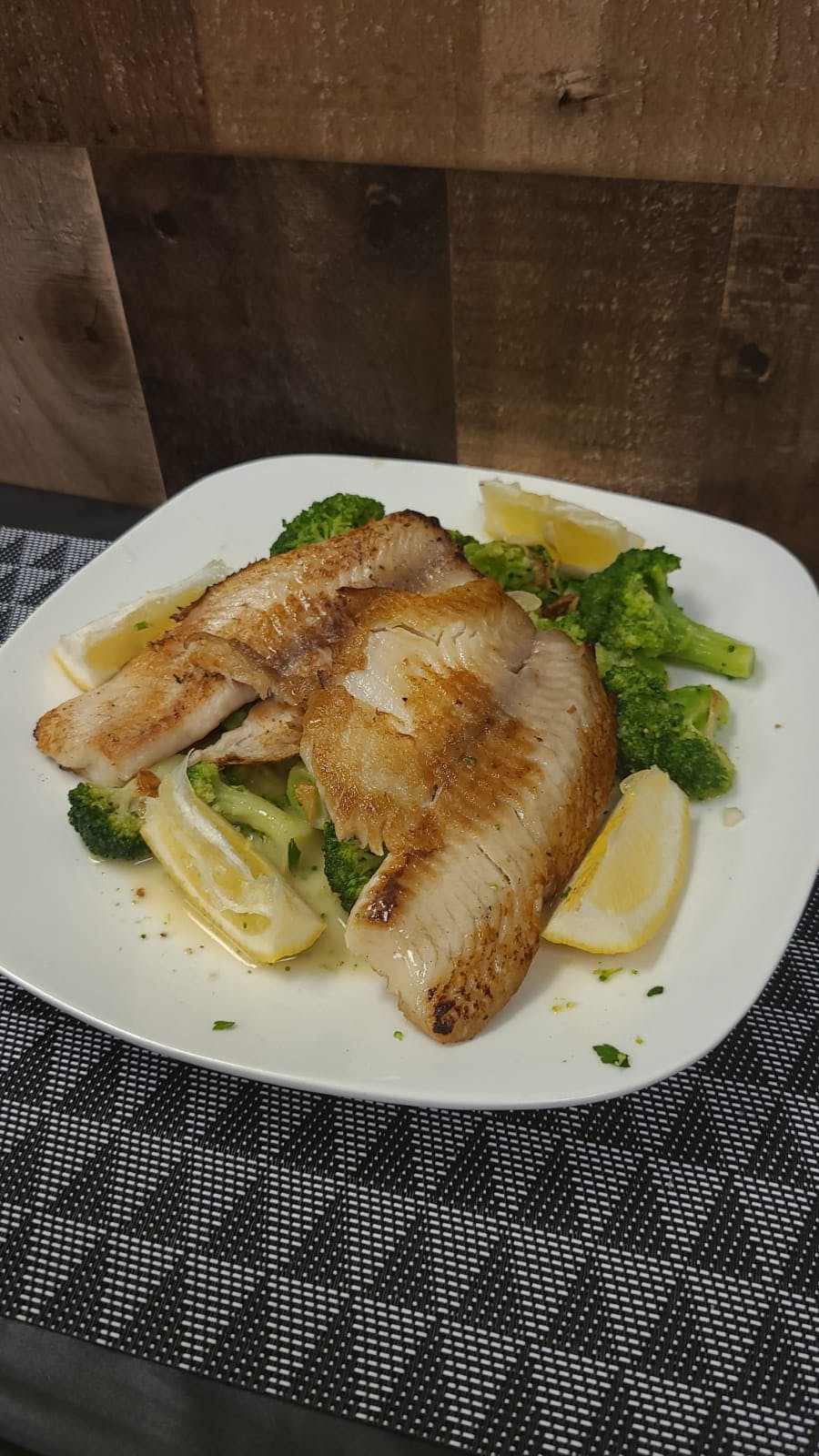 Order Grilled Tilapia with Sauteed Broccoli - Regular food online from Piazza Di Pizza store, Moonachie on bringmethat.com