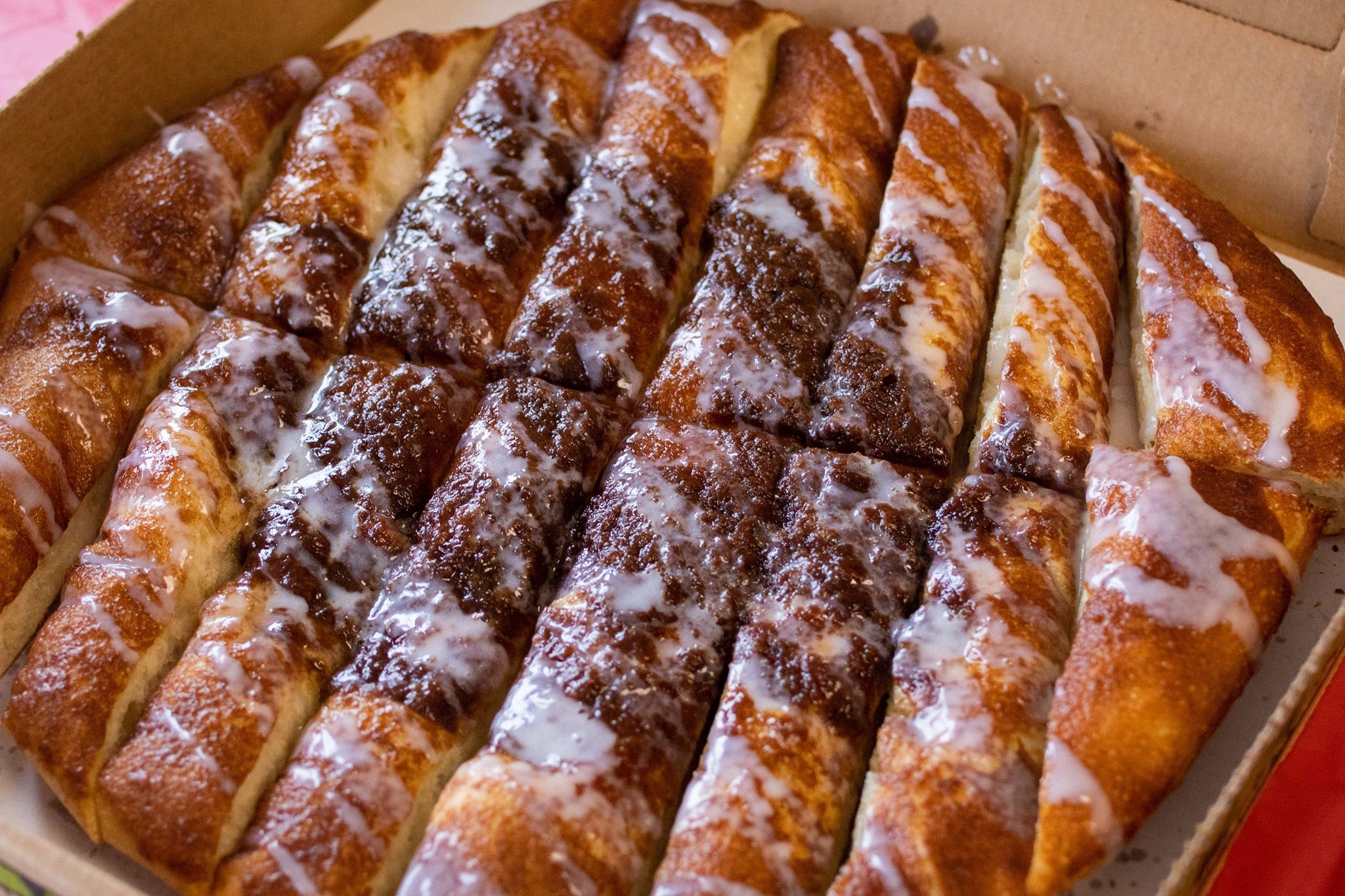 Order Cinnamon Breadsticks - Small food online from Breadeaux Pizza store, Grimes on bringmethat.com
