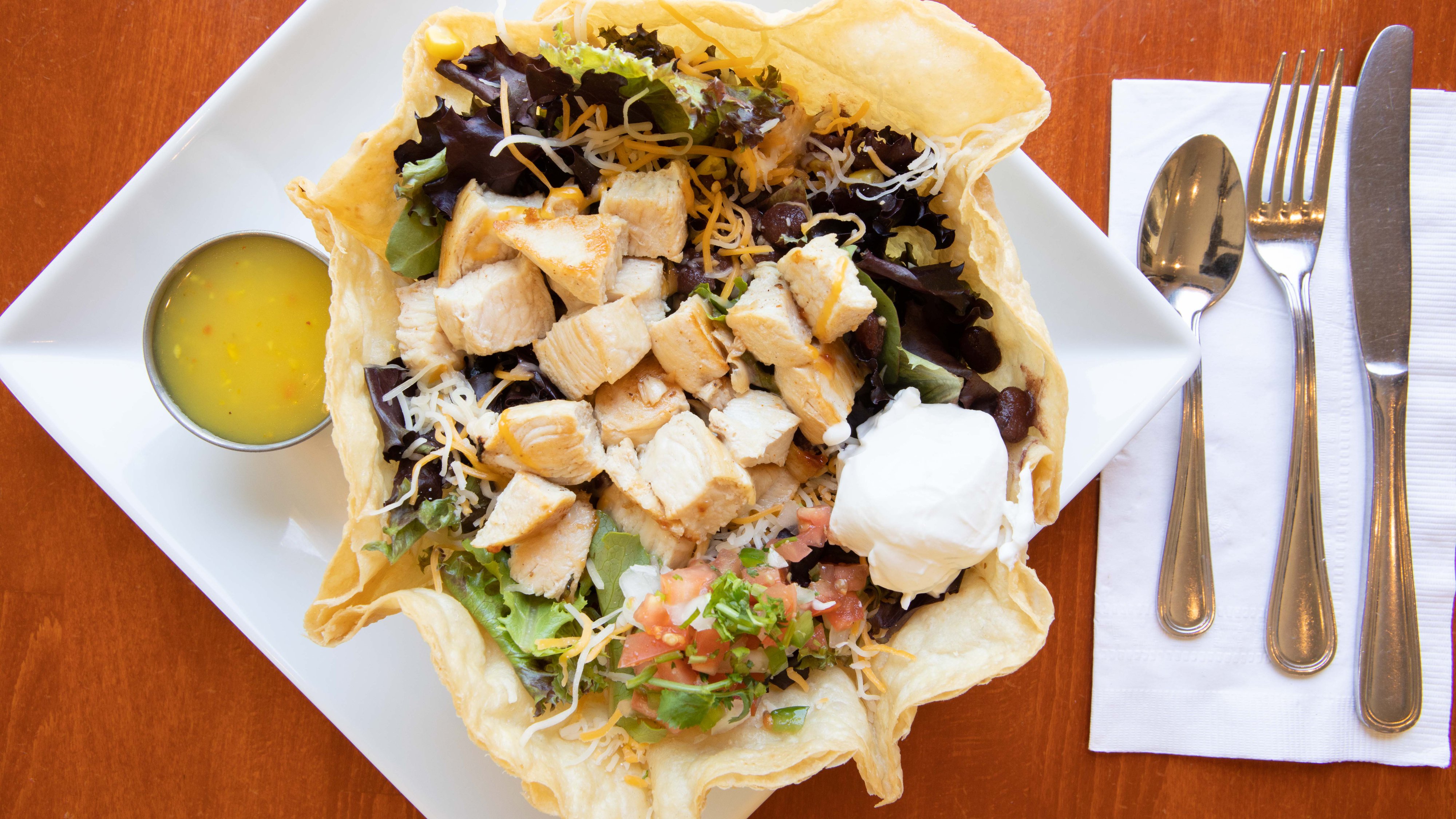 Order Tostada Salad food online from Old Town Cafe store, Camarillo on bringmethat.com