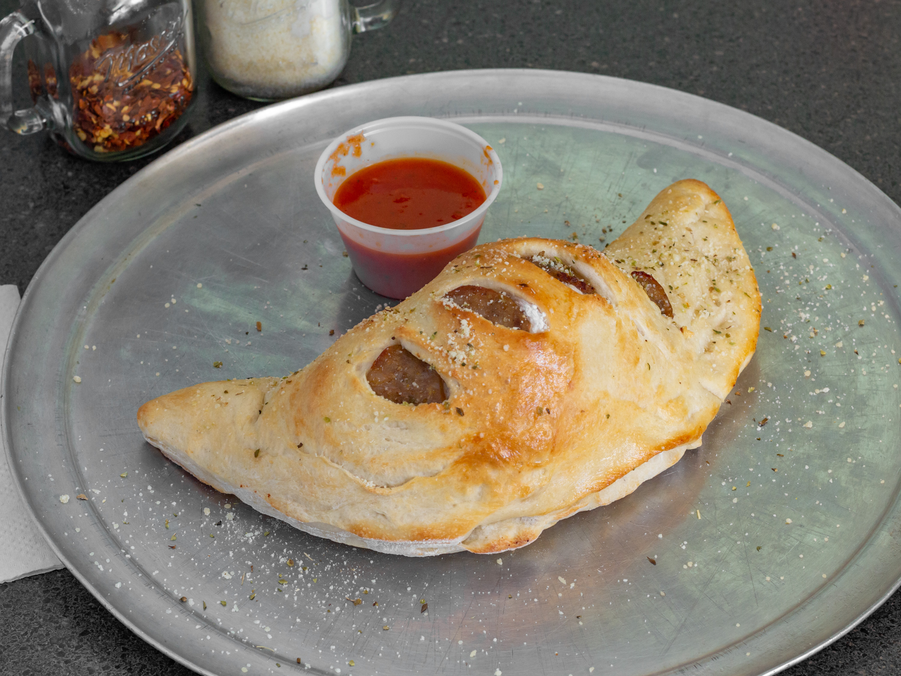 Order Calzone food online from Town center pizzeria store, Virginia Beach on bringmethat.com