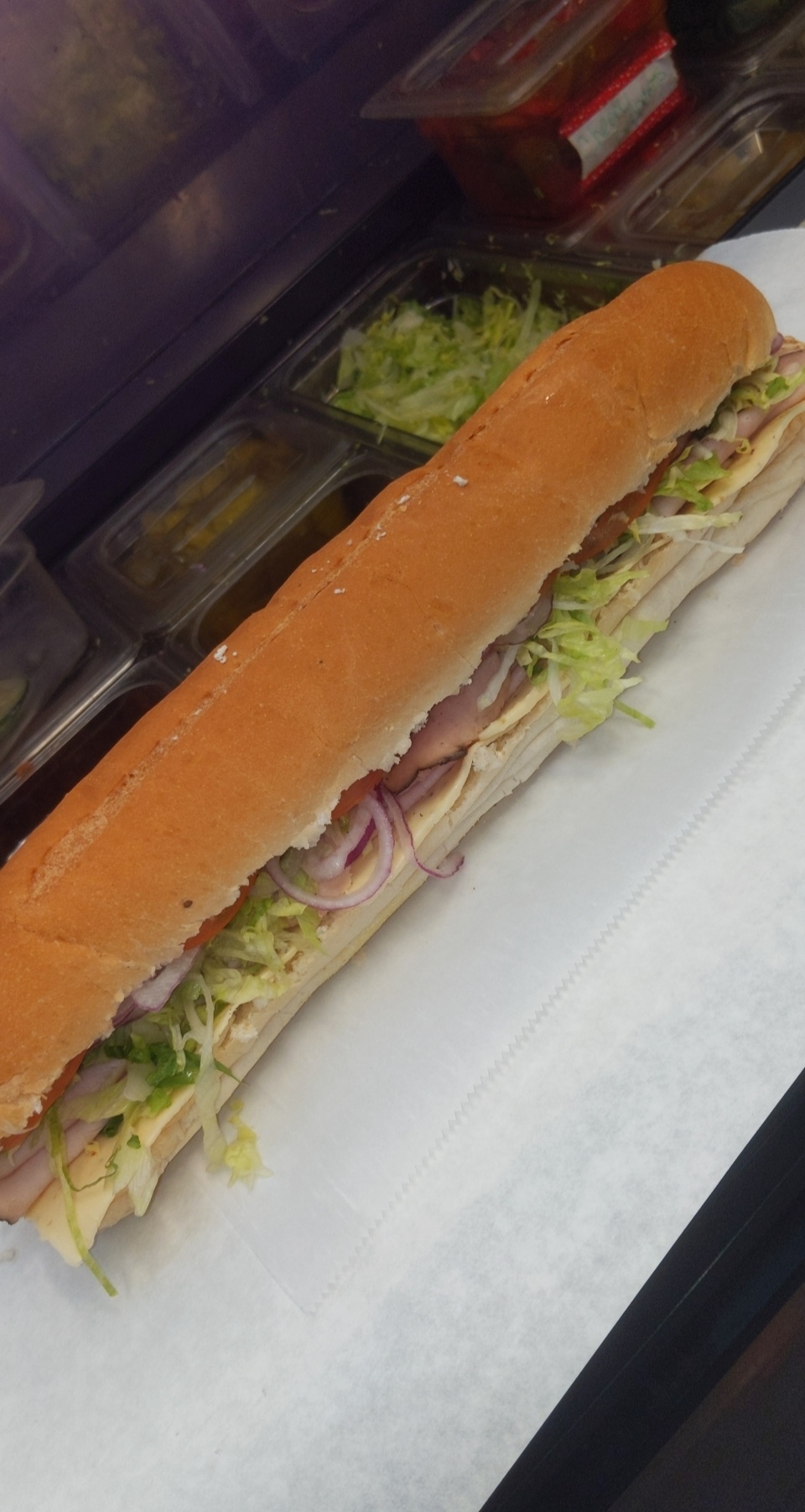 Order Large Honey Roasted Turkey And Cheese Sub food online from Super hero sub shop store, Jersey City on bringmethat.com