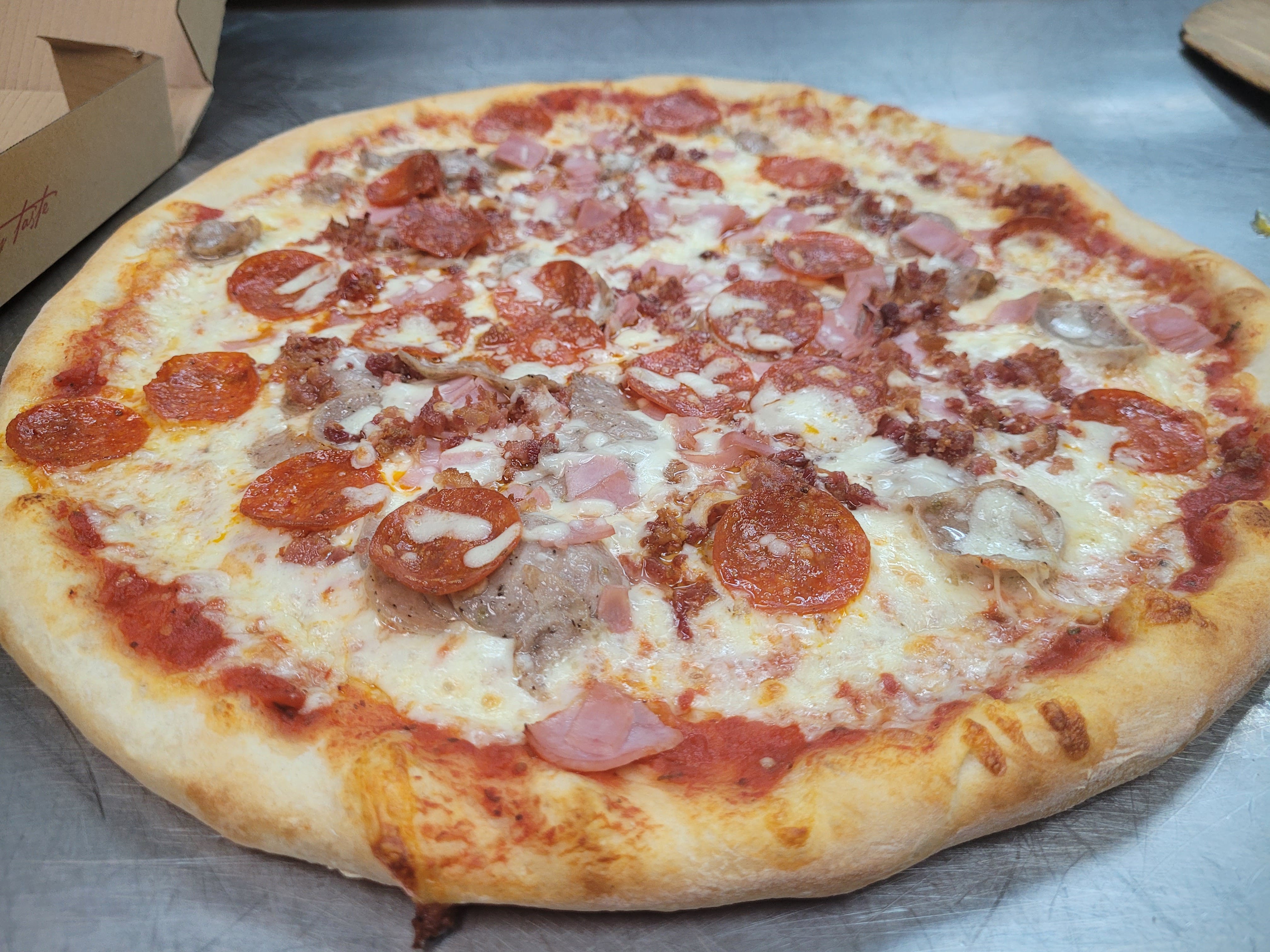 Order Meat Lovers Pizza - Small 12" food online from Brother's Pizza Chambersburg store, Chambersburg on bringmethat.com