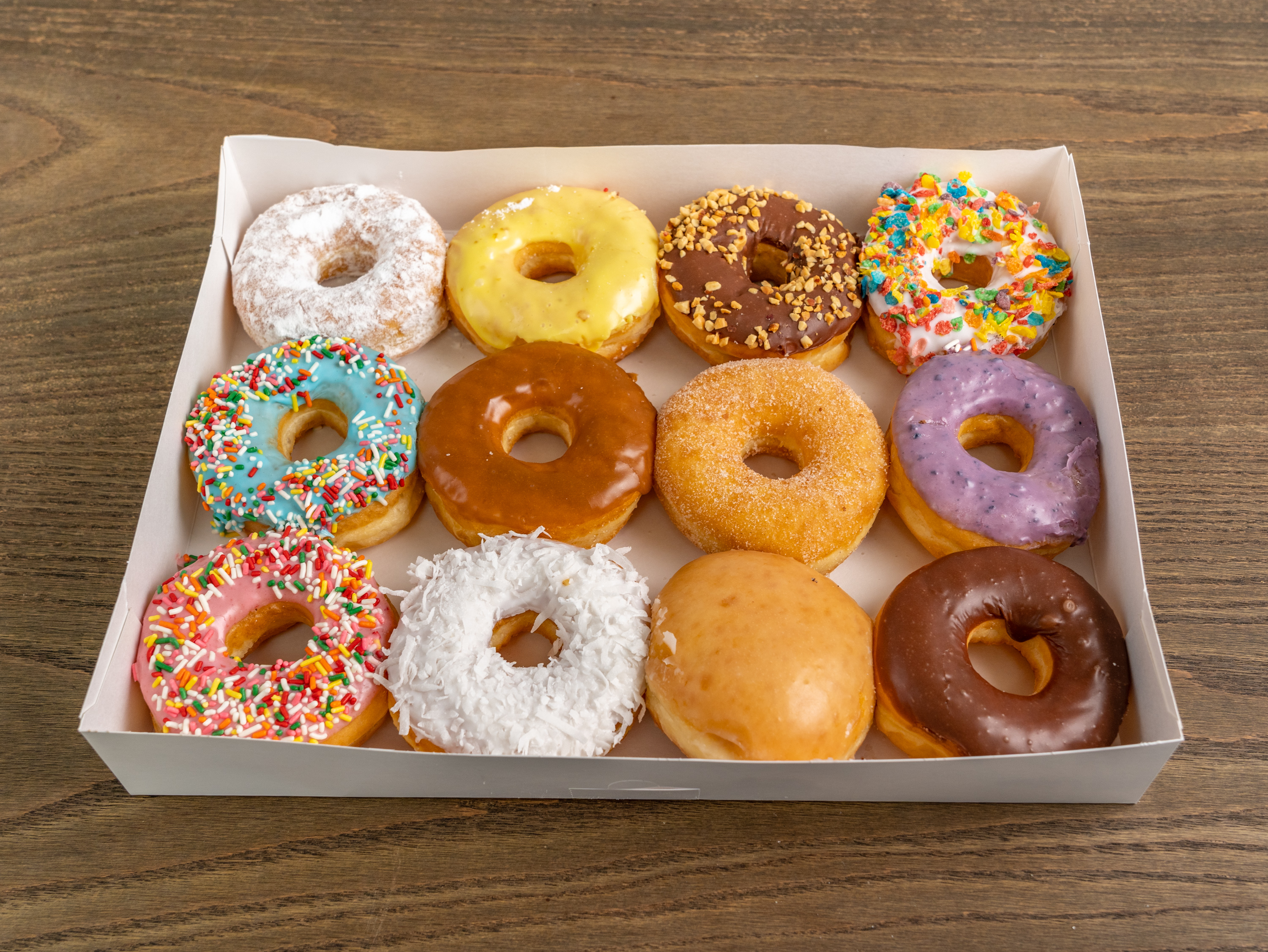 Order Dozen Assorted Donut food online from Snowflake Donuts store, Boerne on bringmethat.com