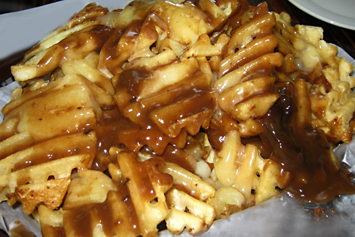 Order Disco Fries food online from Constantine's Delicatessen store, Bayside on bringmethat.com