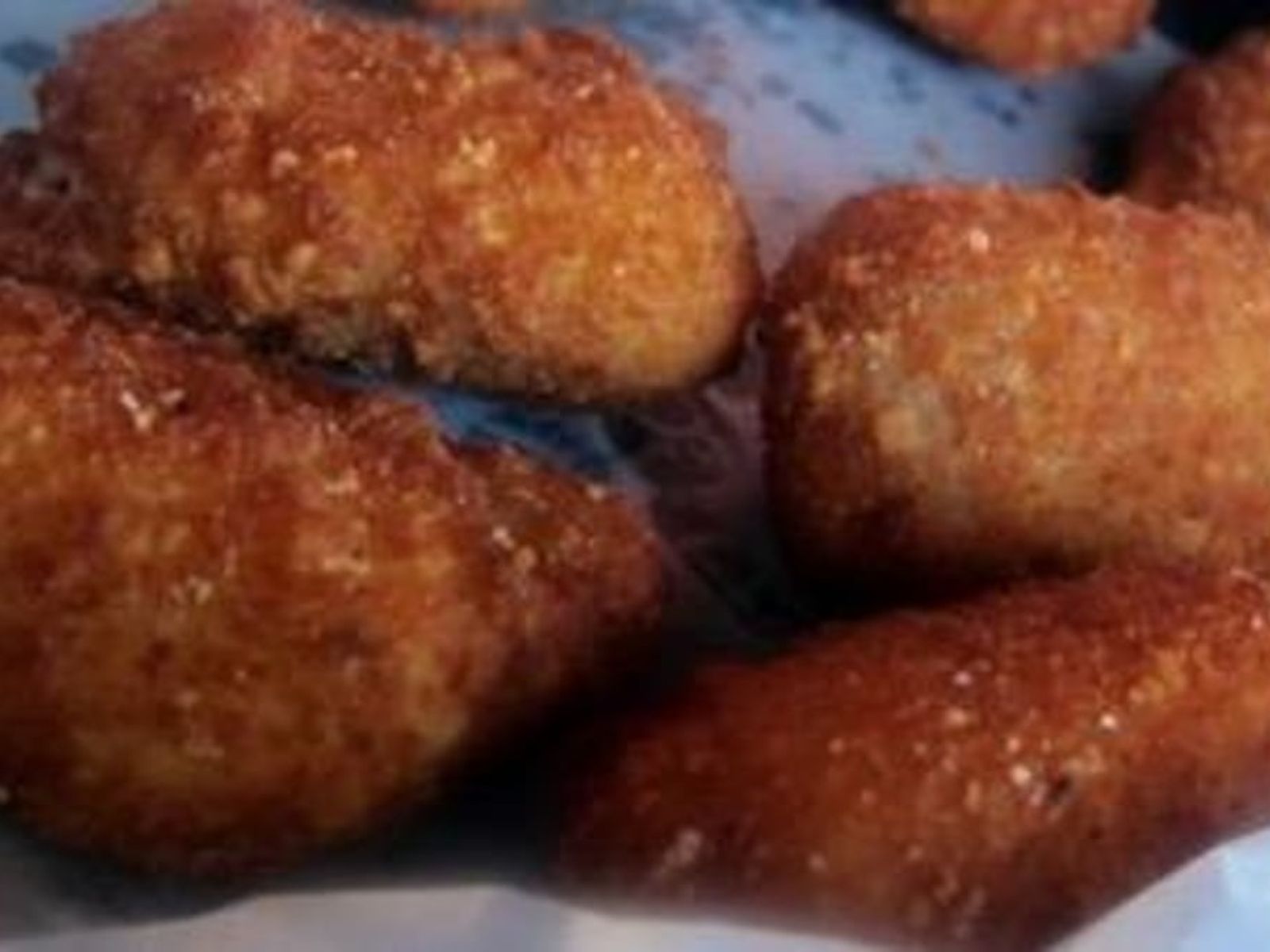 Order Jalapeno Poppers food online from Moose Hill Cantina store, Denver on bringmethat.com