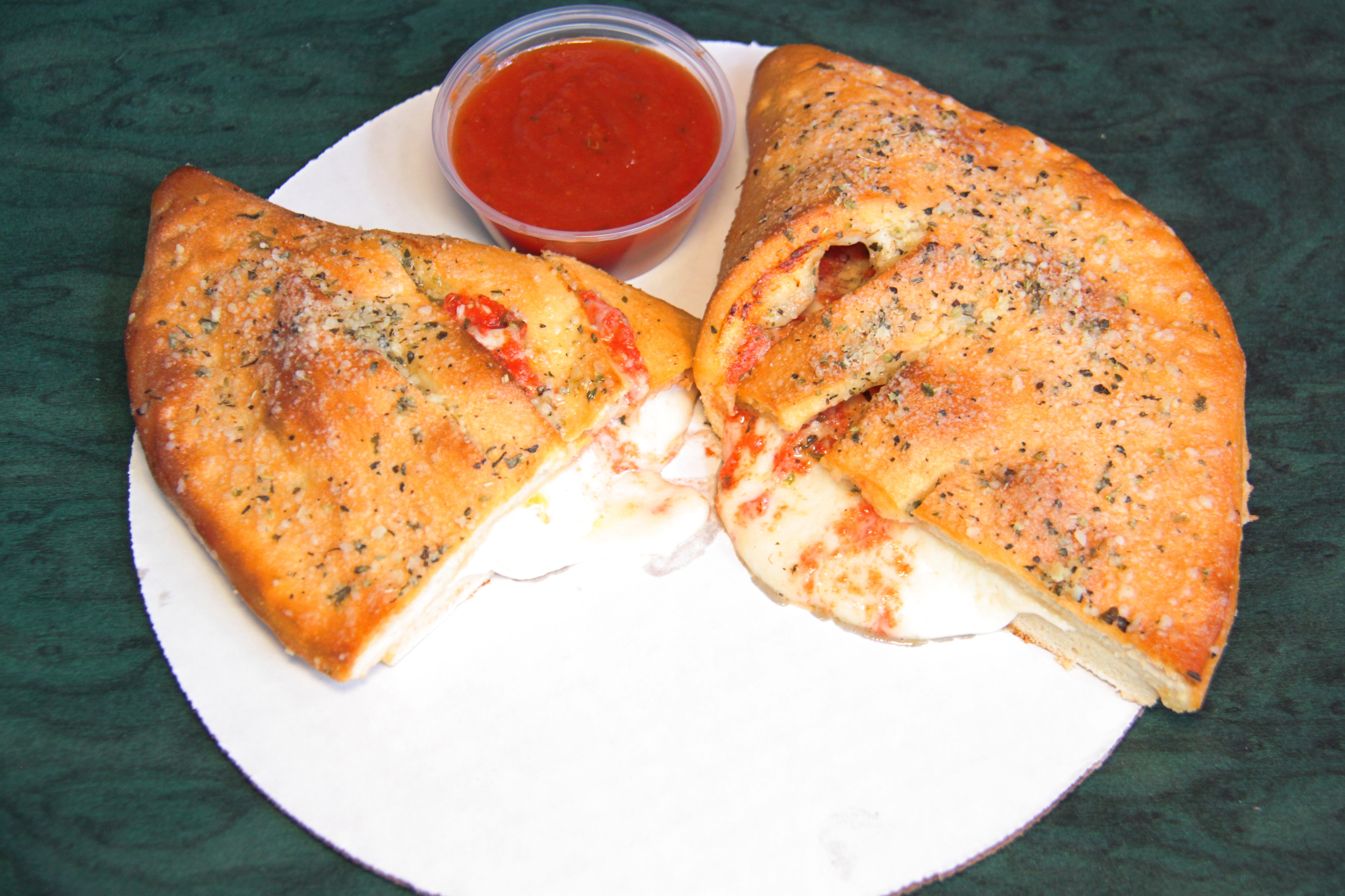 Order Cheese Calzone food online from M&G Pizza store, Chicago on bringmethat.com