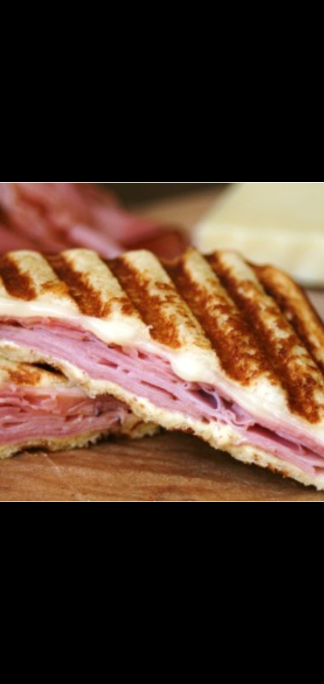 Order Ham & Melted Cheese Breakfast Panini  food online from American Gourmet Foods Deli store, New York on bringmethat.com