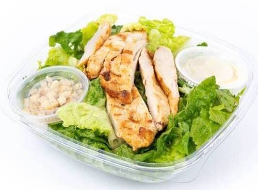 Order Grilled Chicken Caesar Salad  food online from Fialkoff Kosher Pizza store, Lawrence on bringmethat.com