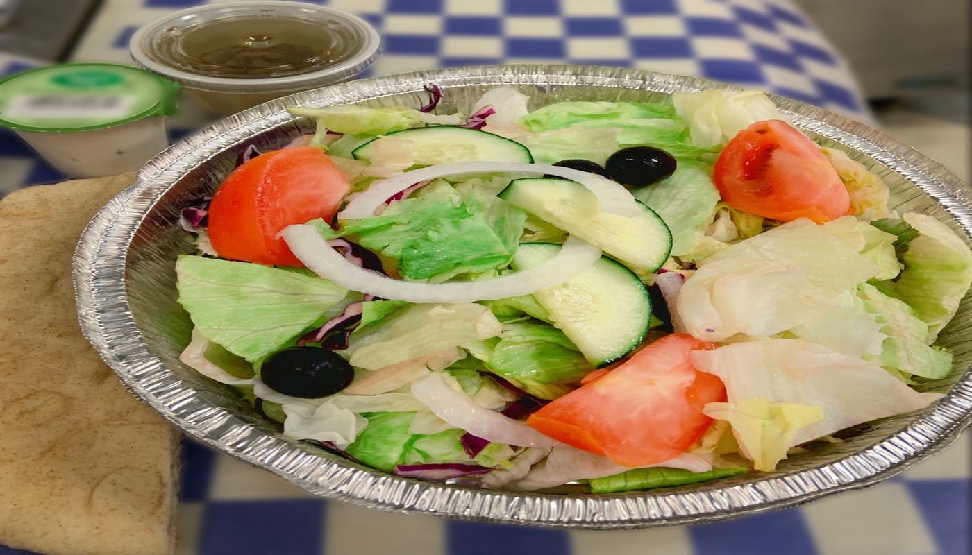 Order Garden Salad - Salad food online from Village Pizza & Seafood store, Dickinson on bringmethat.com