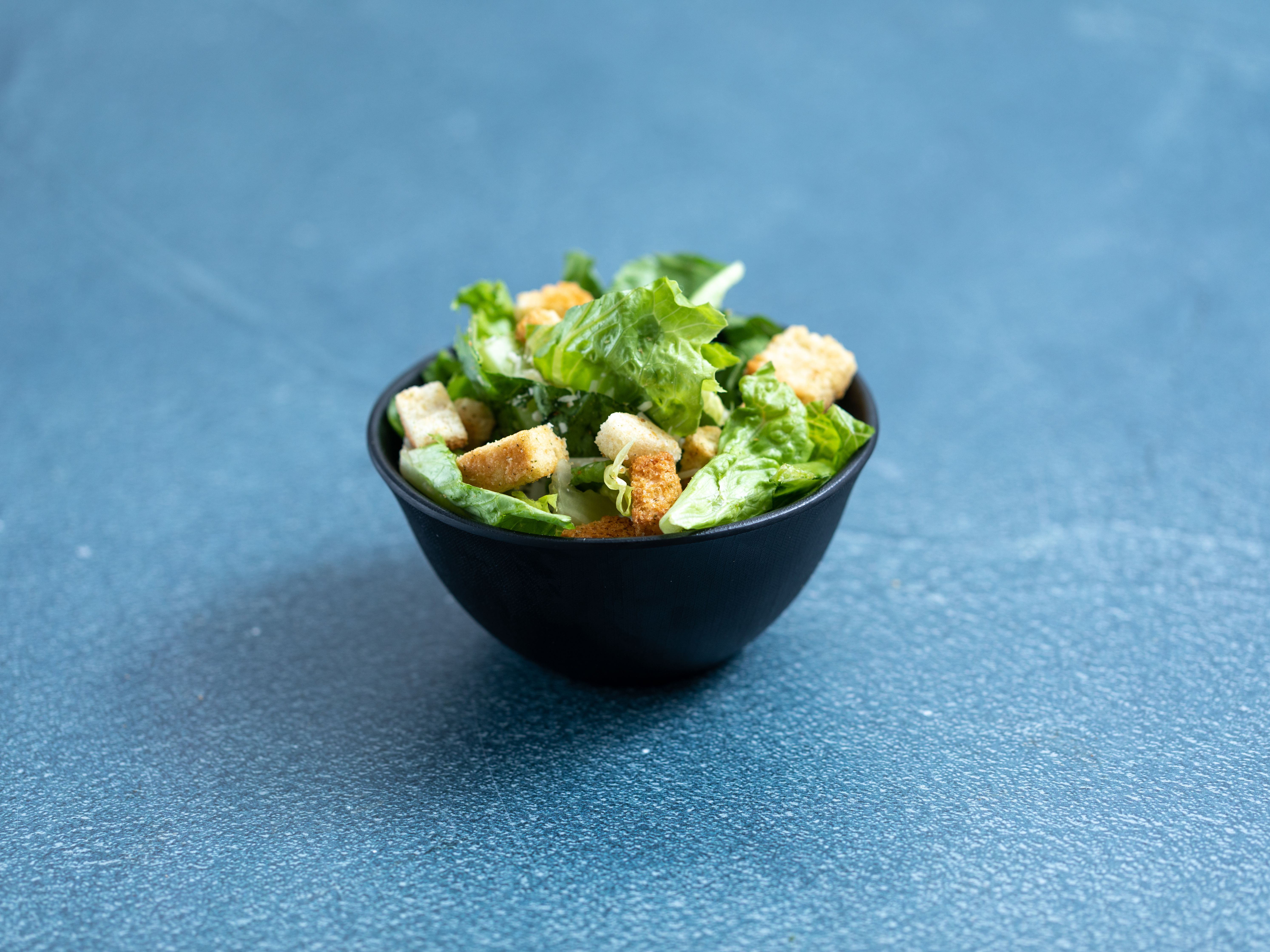 Order Caesar Salad food online from Fiorella Express store, Belmont on bringmethat.com
