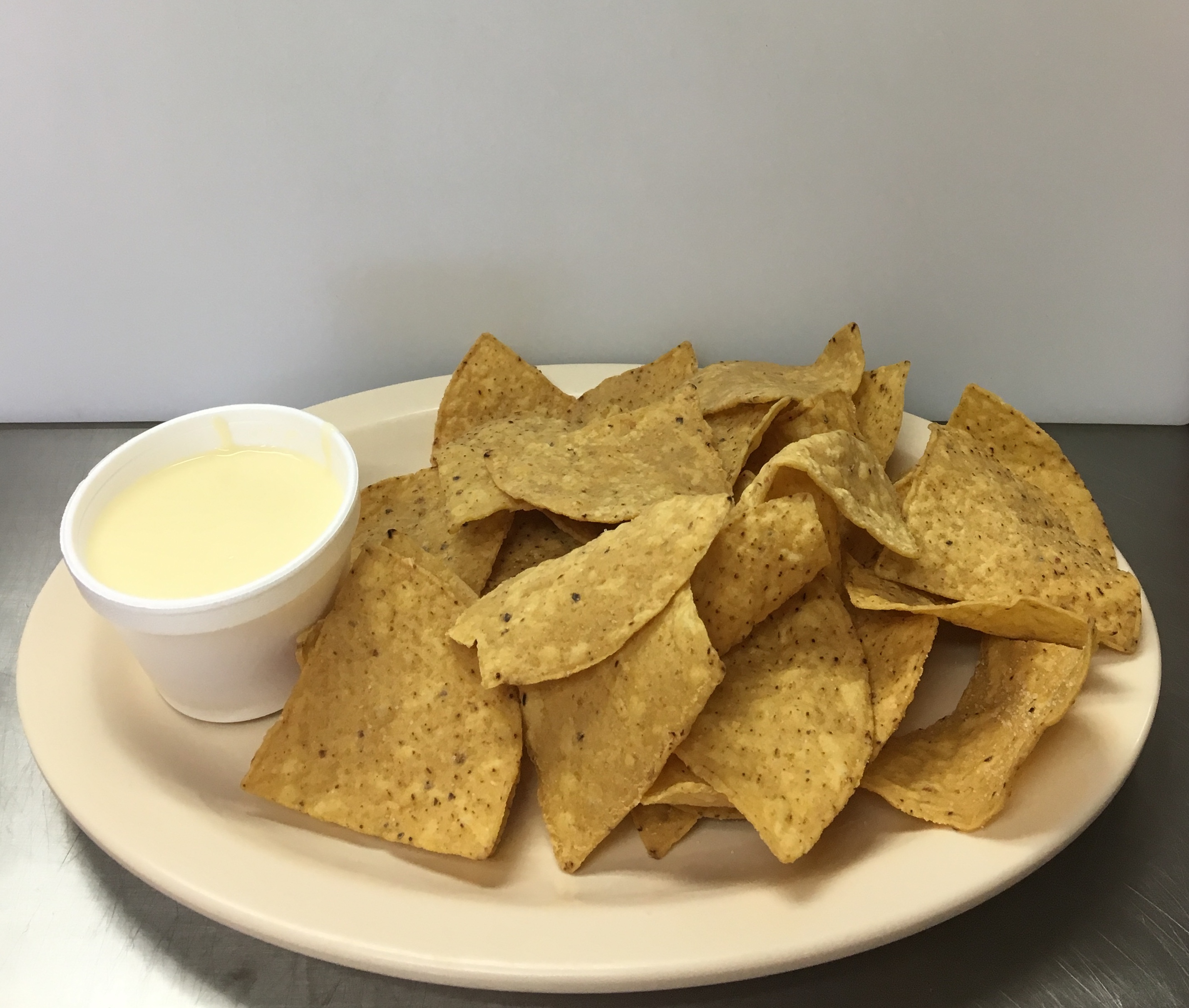 Order Chips and queso food online from El Rancho Mexican Grill - Cottage Grove Road store, Madison on bringmethat.com