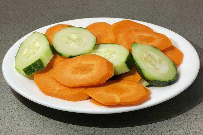 Order Sliced Carrots and Cucumbers food online from Europe Cafe & Grill store, Tenafly on bringmethat.com