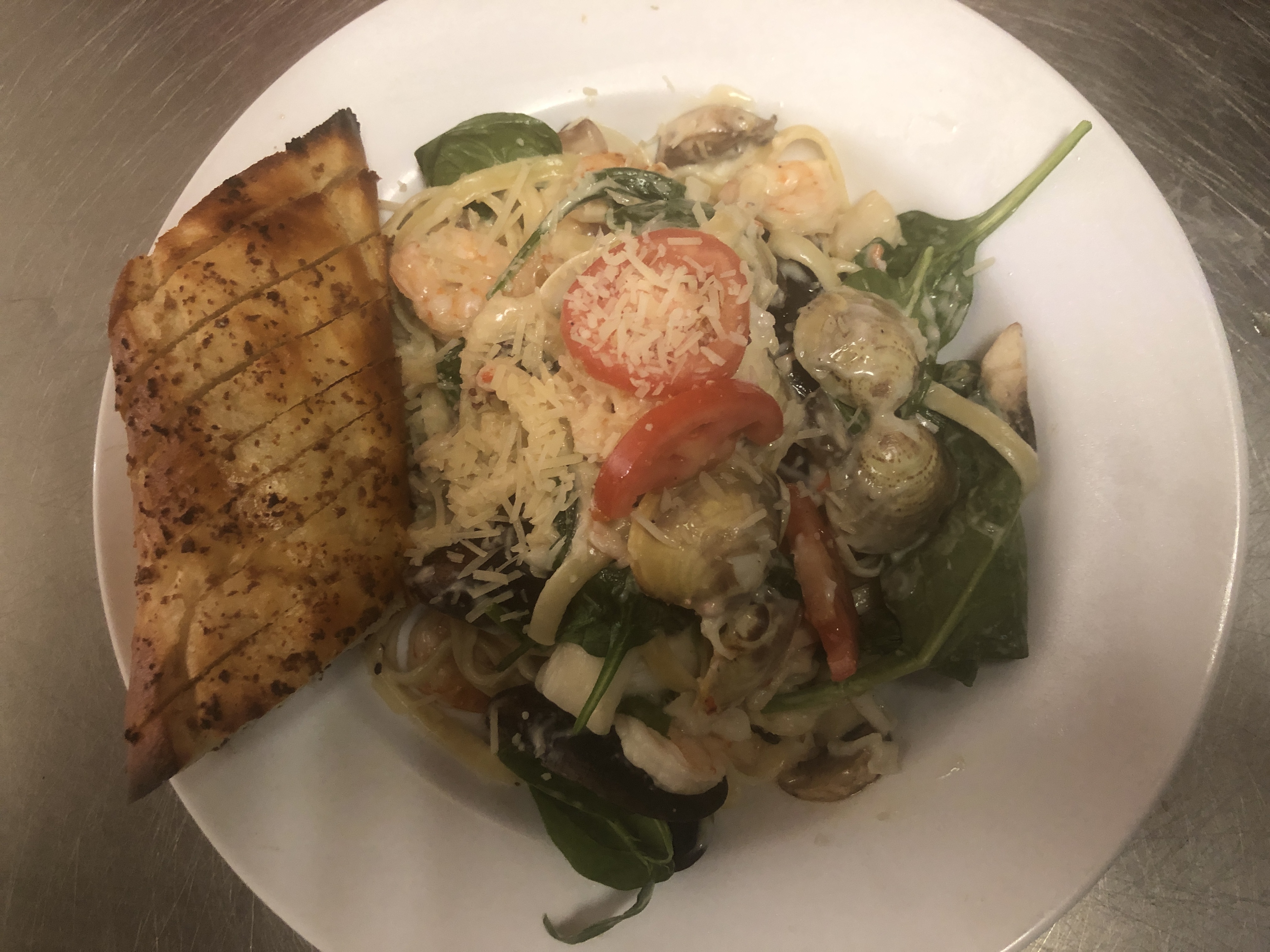 Order Seafood Fettuccine Pasta food online from Fabulous Pizza store, Valdosta on bringmethat.com