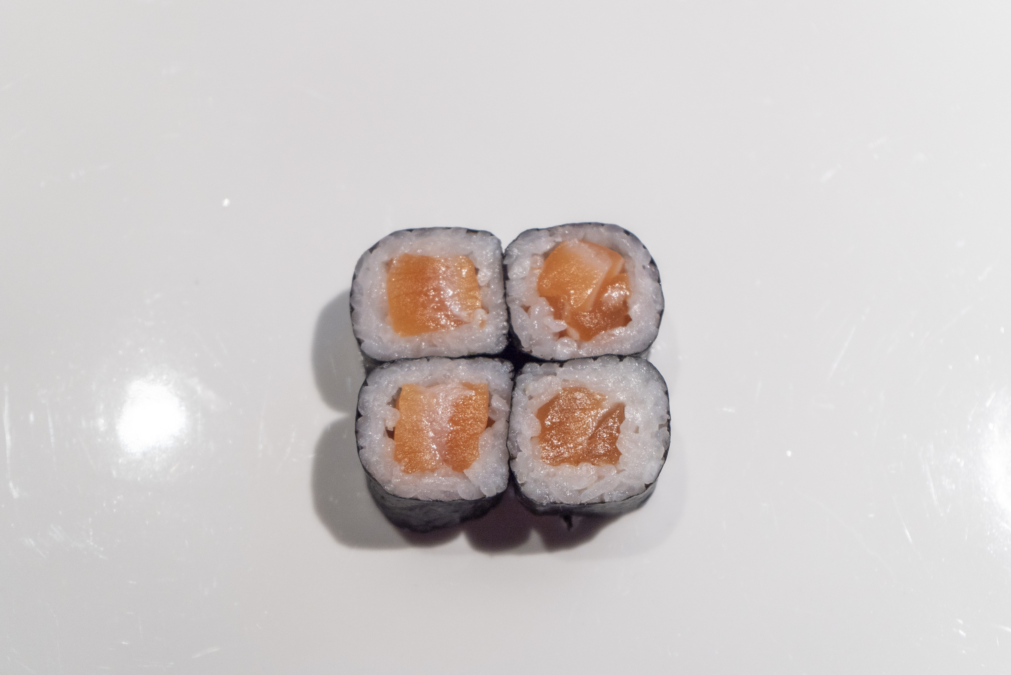 Order Salmon Roll food online from Zutto Japanese American Pub store, New York on bringmethat.com