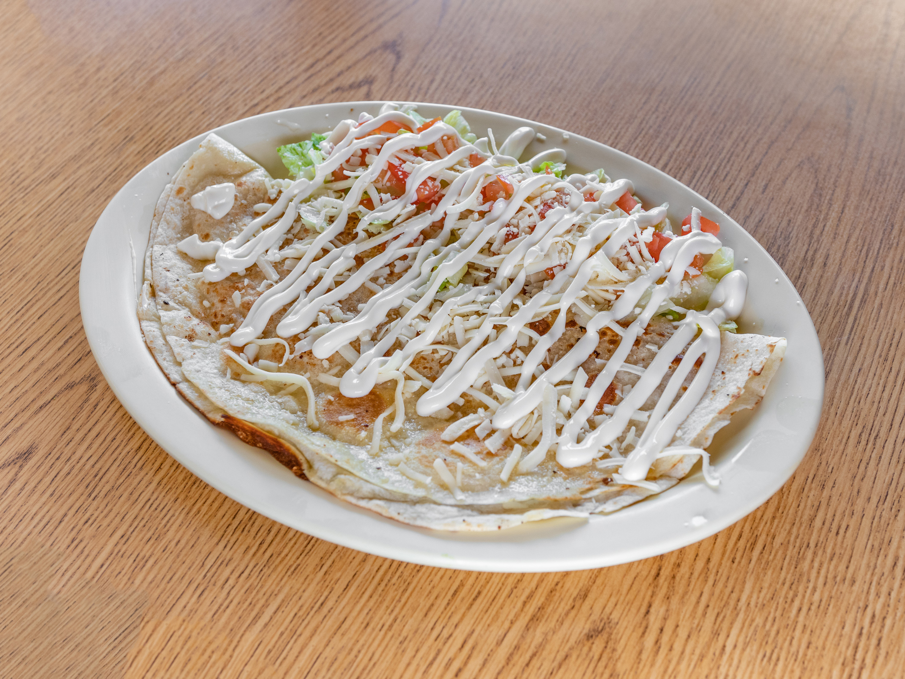Order Cheese Quesadilla food online from Taqueria Los Compadres store, Omaha on bringmethat.com