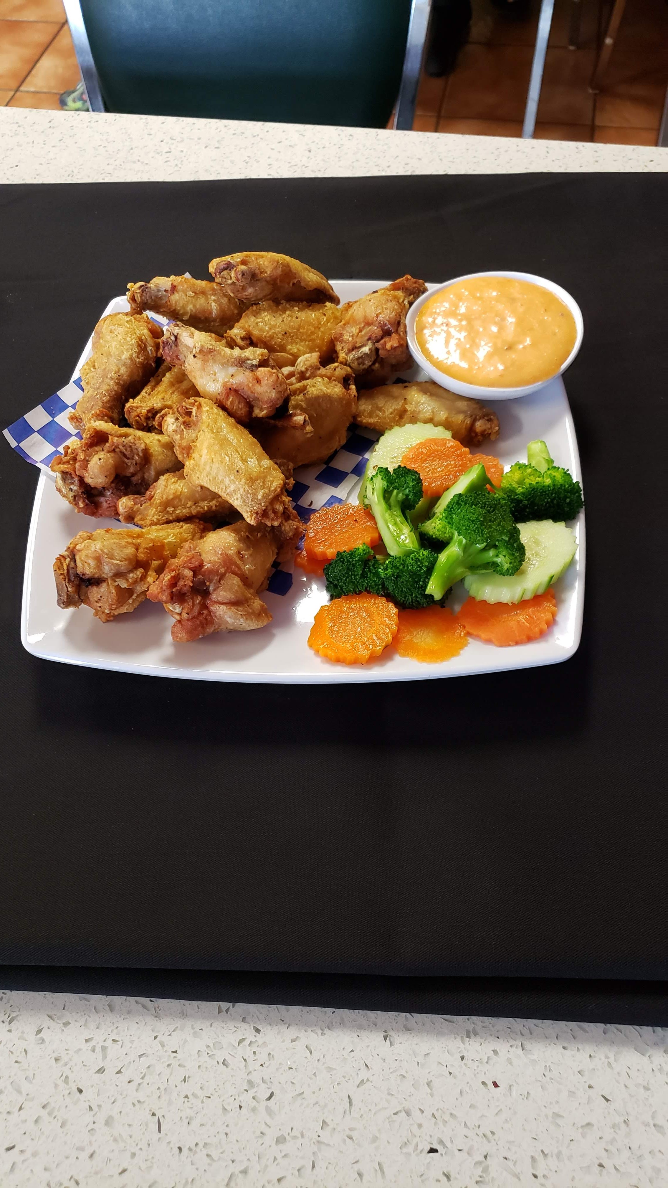 Order A1. Fried Chicken Wings food online from I Love Pho Menudo And Taco store, Fresno on bringmethat.com