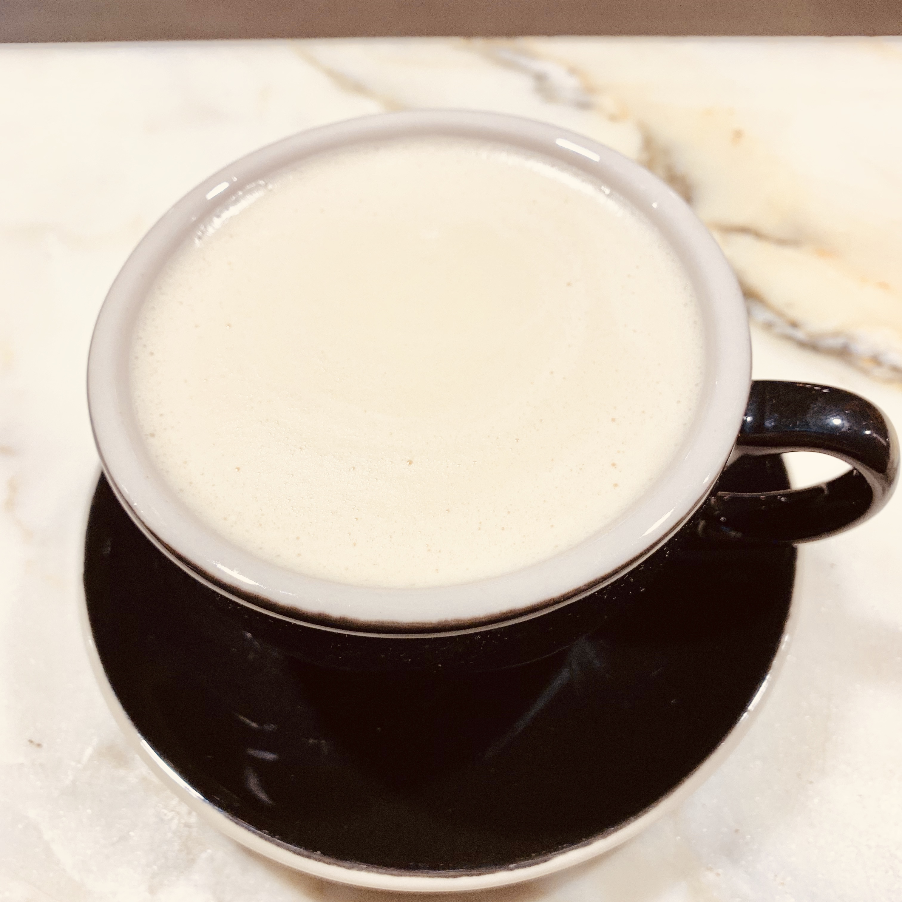 Order Chai latte food online from Madman Espresso store, New York on bringmethat.com