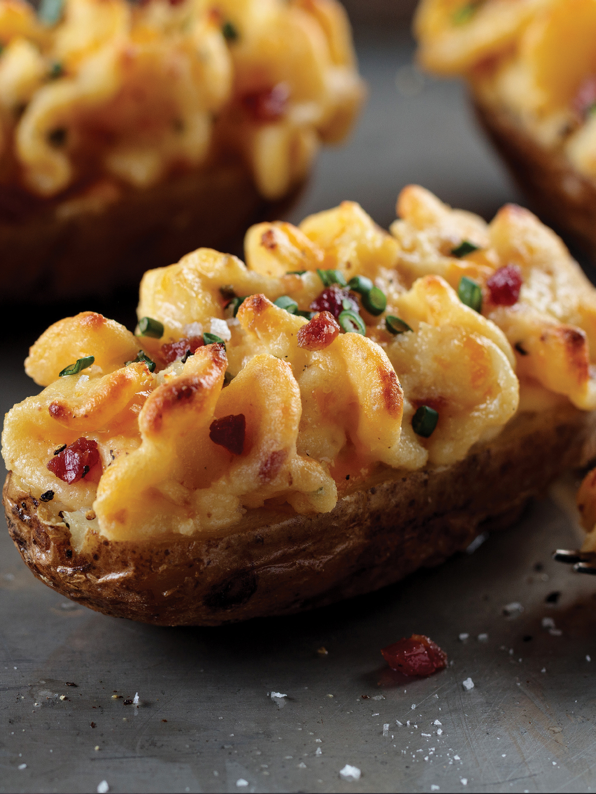 Order 4 Stuffed Baked Potatoes (5.5 oz.) food online from Omaha Steaks store, Orland Park on bringmethat.com