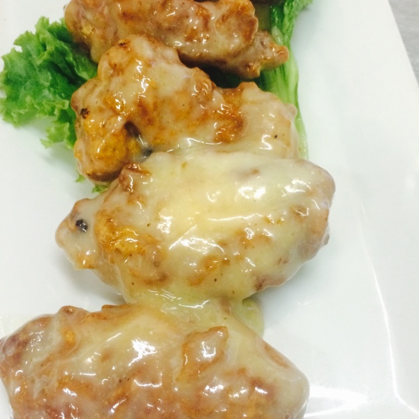 Order 5 Creamy Lemon Wings food online from Thai Tea Asian Fusion Cafe  store, Irving on bringmethat.com