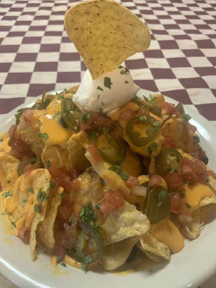 Order Nachos food online from Trackside Pizza store, Puyallup on bringmethat.com