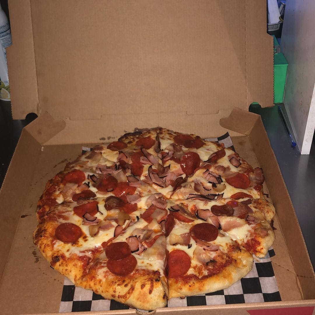 Order 4. Meatlover Pizza - Large 16" food online from Harry's Expressway store, Leicester on bringmethat.com