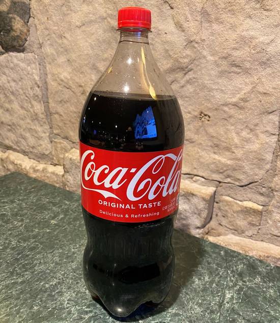 Order Coke 2Liter food online from Beggars Pizza store, Chicago on bringmethat.com