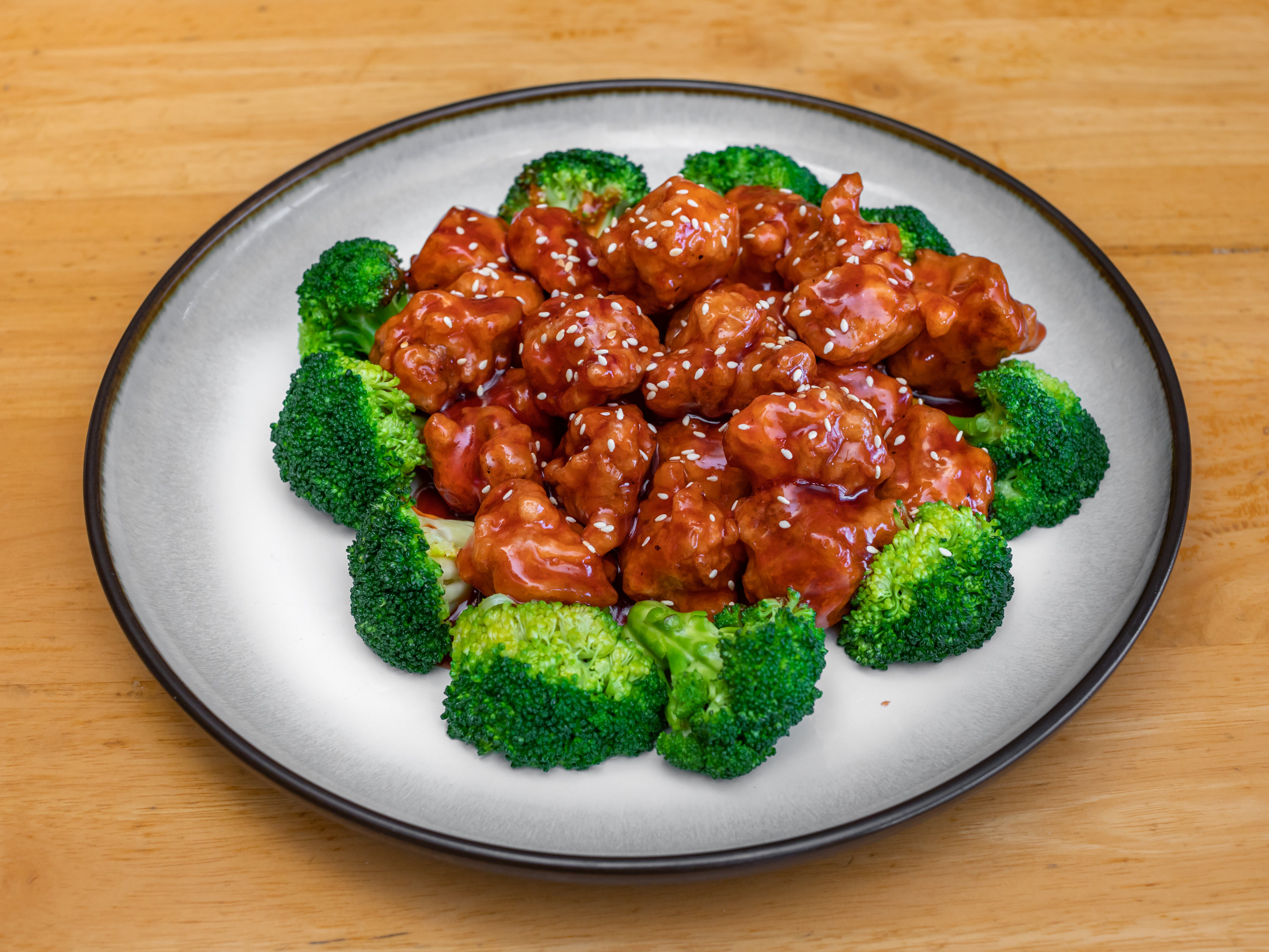 Order C2. Sesame Chicken food online from Rice King Chinese Restaurant store, Toledo on bringmethat.com