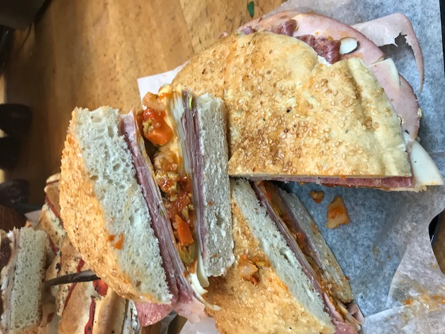 Order Muffaletta  food online from Mike's Deli store, Bronx on bringmethat.com