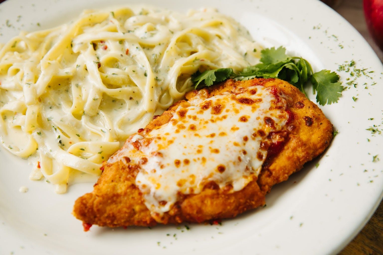 Order Chicken Parmigiana - Entree food online from Sam Italian Cafe store, Fort Worth on bringmethat.com