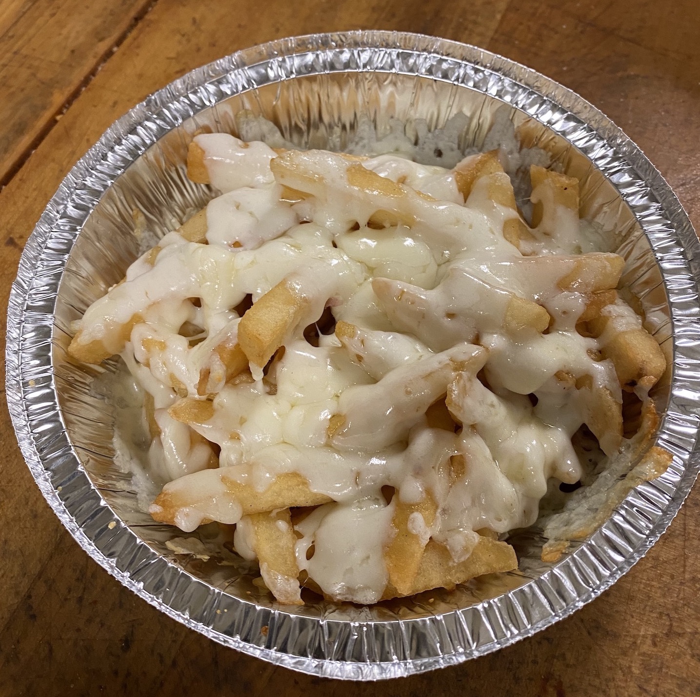 Order Cheese Fries food online from Capri Pizza & Restaurant store, Plumsteadville on bringmethat.com