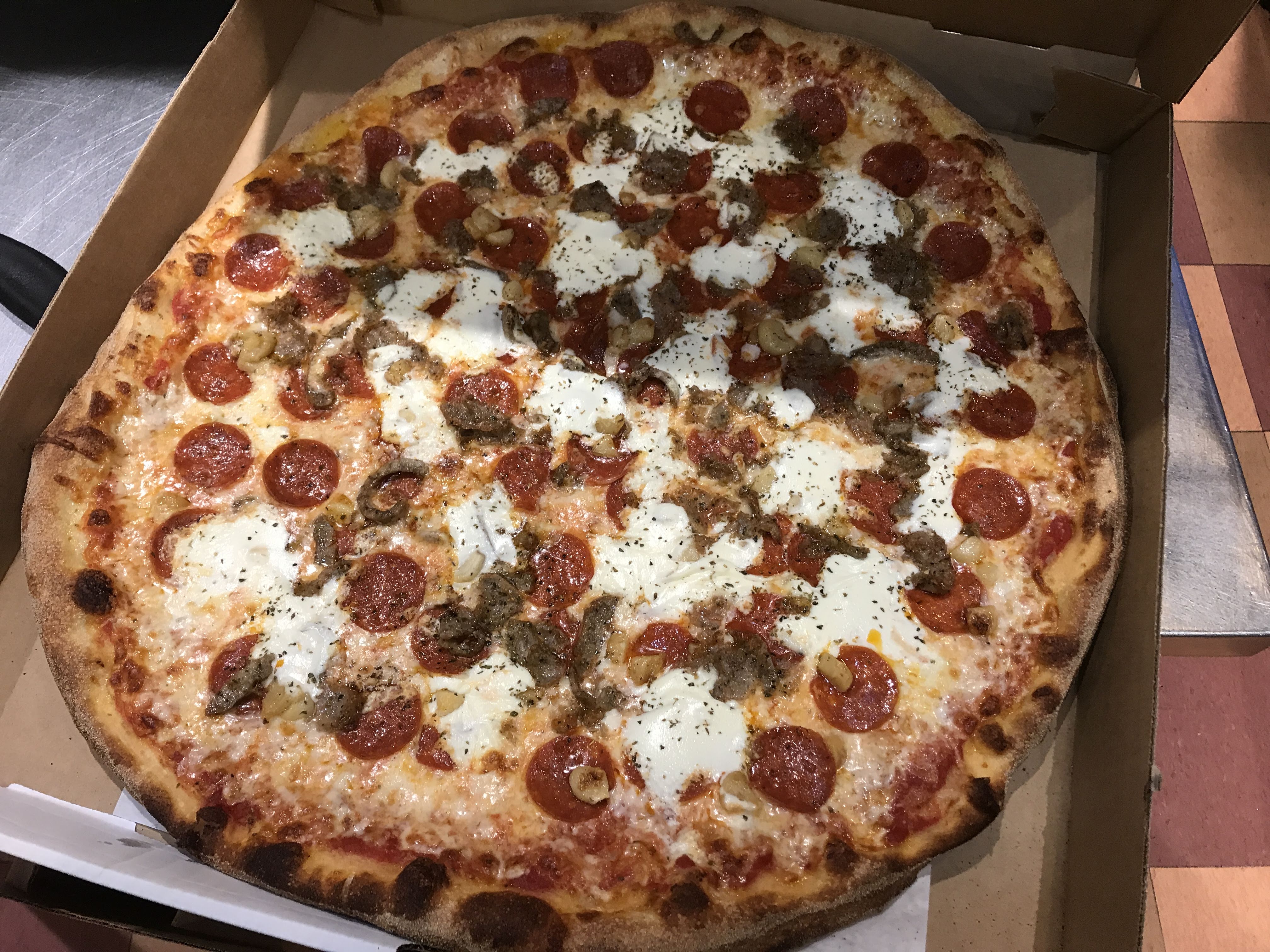 Order Brooklyn Pie food online from Supreme Pizza store, Boston on bringmethat.com