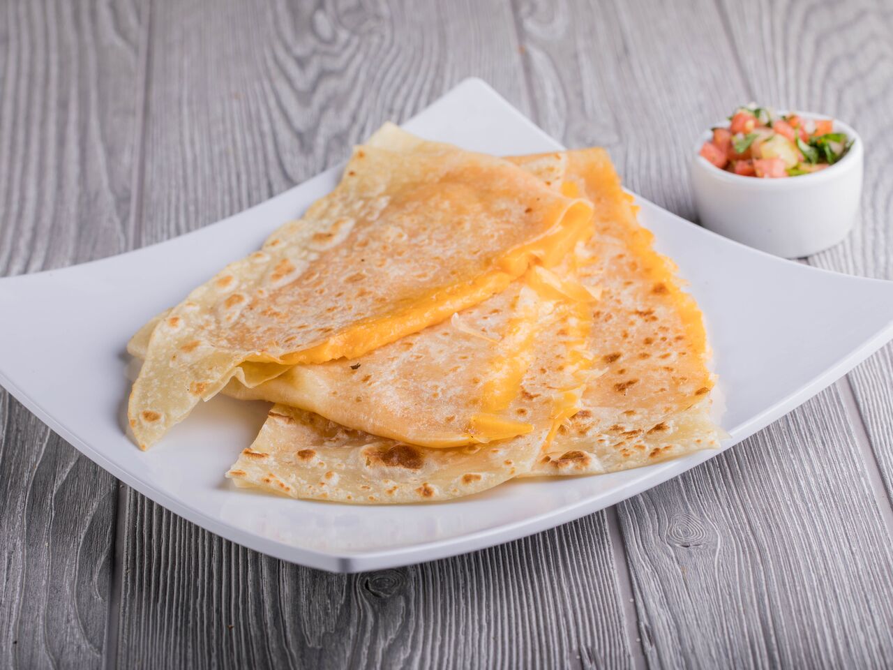 Order Cheese Quesadilla food online from Ray Mexican Restaurant store, San Diego on bringmethat.com