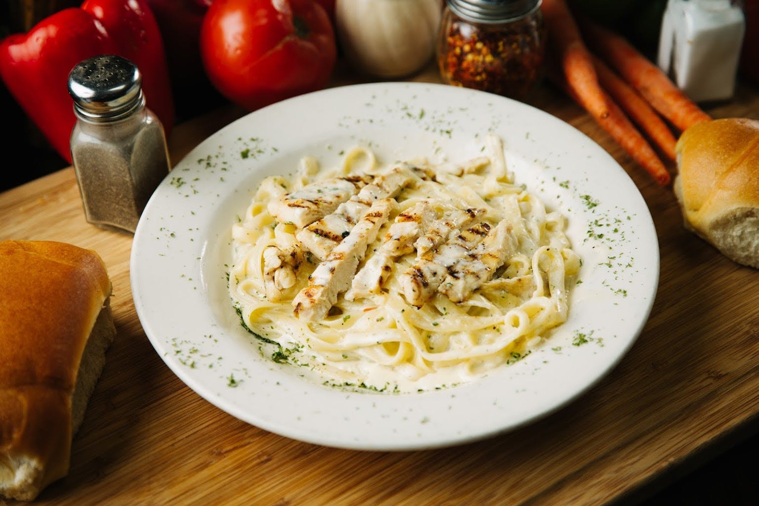 Order Alfredo Pasta with Chicken - Pasta food online from Sam Italian Cafe store, Fort Worth on bringmethat.com