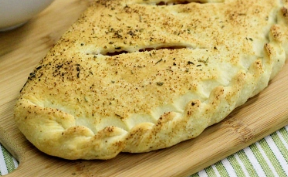 Order 1 Topping Calzone food online from Husson Pizza store, Charleston on bringmethat.com