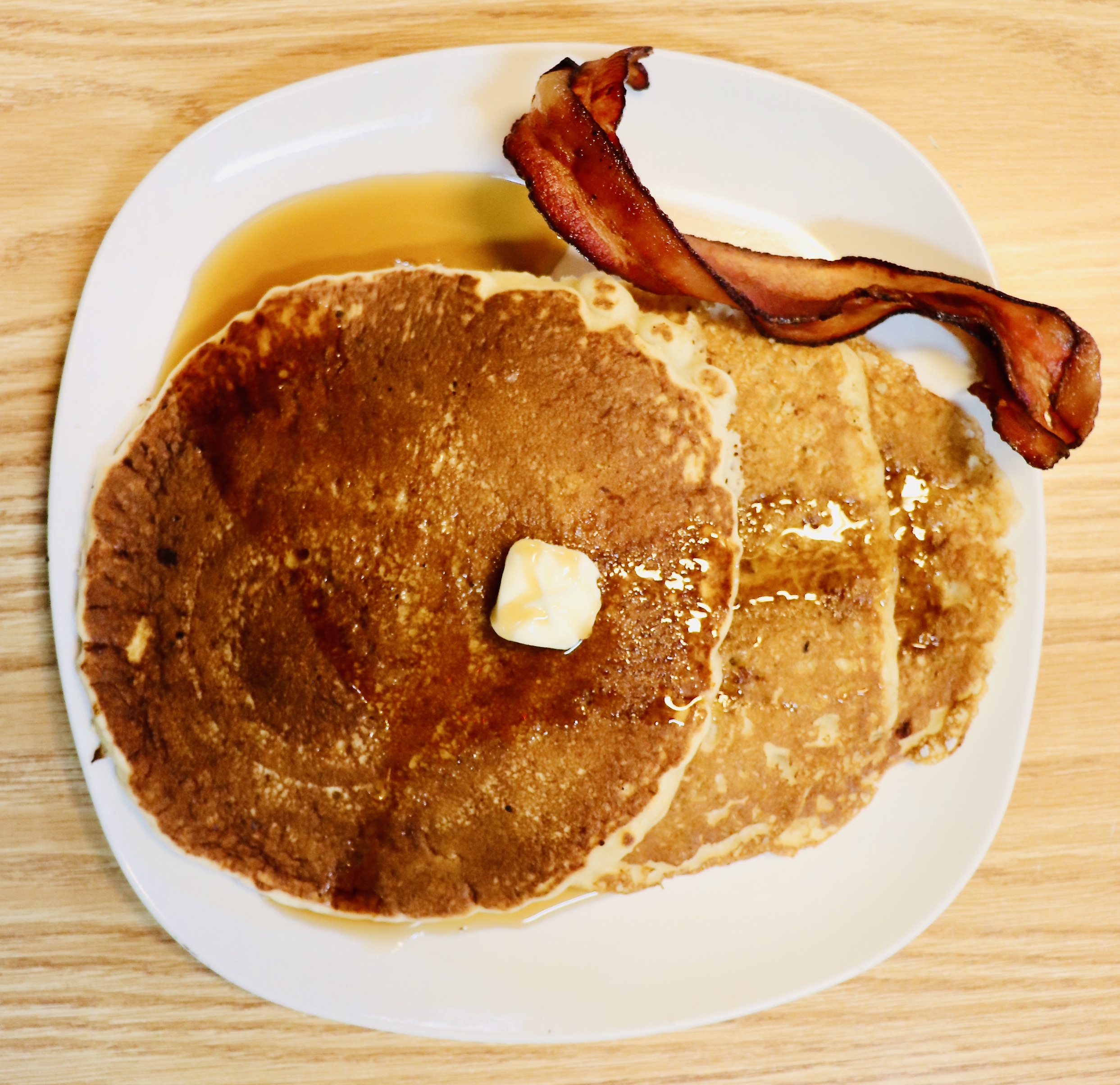 Order Pancake with Bacon food online from Charlie Cafe store, Norfolk on bringmethat.com