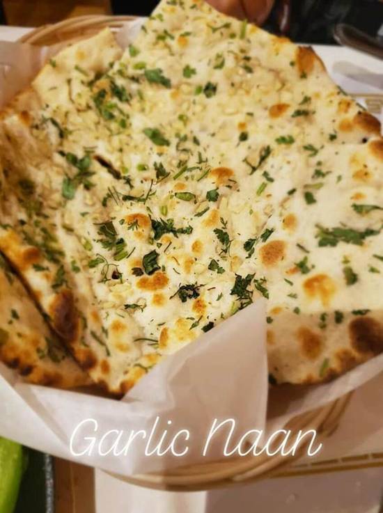 Order Garlic Naan food online from Royal Delhi Palace store, Los Angeles on bringmethat.com